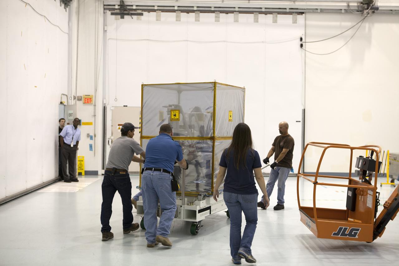 CAPE CANAVERAL, Fla. – Part of NASA's International Space Station-RapidScat scatterometer instrument is moved into Space Station Processing Facility at Kennedy Space Center in Florida. ISS-RapidScat is the first scientific Earth-observing instrument designed to operate from the exterior of the space station. It will measure Earth's ocean surface wind speed and direction, providing data to be used in weather and marine forecasting. Built at NASA's Jet Propulsion Laboratory, ISS-RapidScat is slated to fly on the SpaceX-4 commercial cargo resupply flight in 2014. For more information, visit http://www.jpl.nasa.gov/missions/iss-rapidscat. Photo credit: NASA/Dimitri Gerondidakis