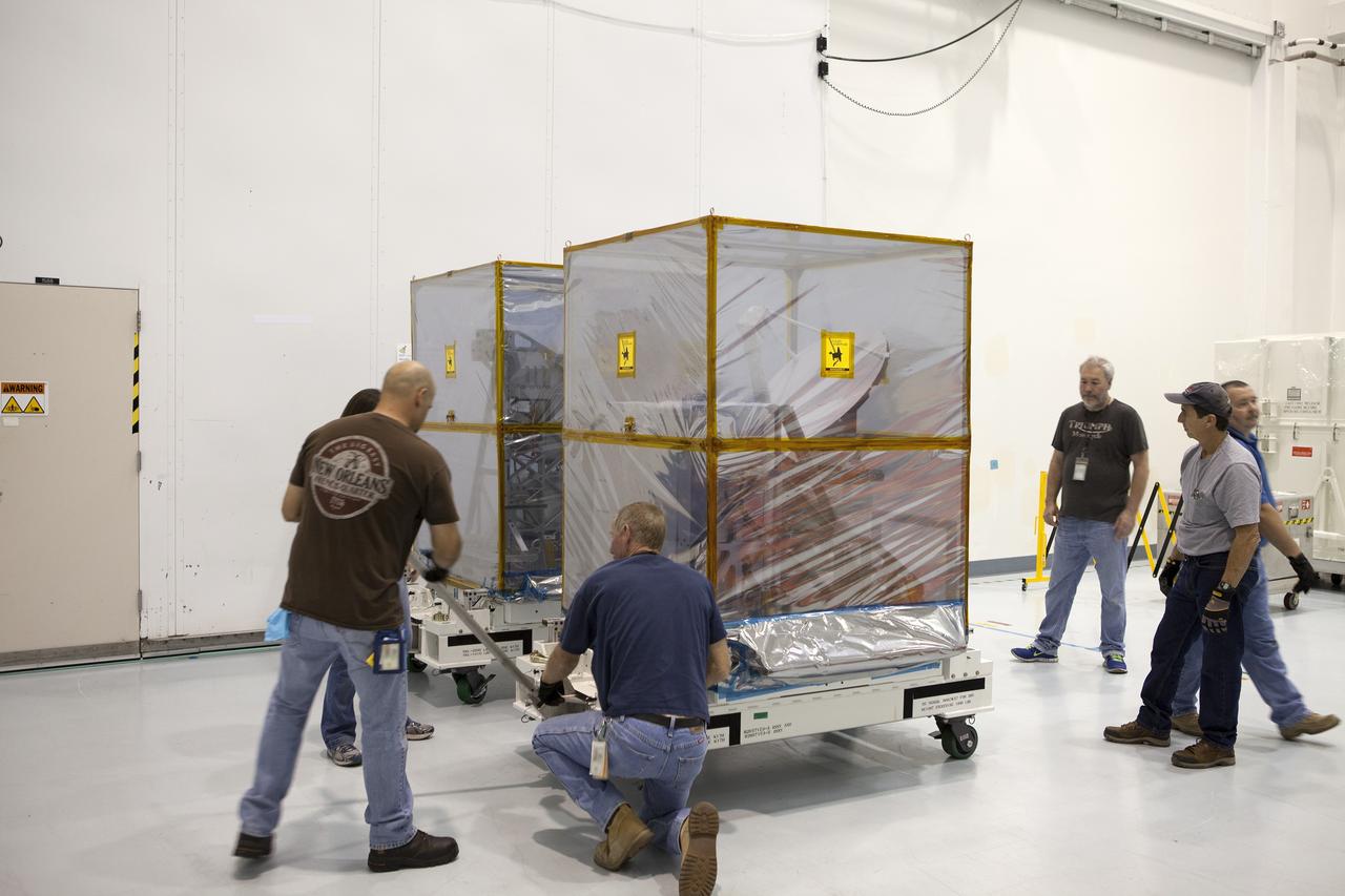 CAPE CANAVERAL, Fla. – The components of NASA's International Space Station-RapidScat scatterometer instrument are moved into a laboratory inside Kennedy Space Center's Space Station Processing Facility. ISS-RapidScat is the first scientific Earth-observing instrument designed to operate from the exterior of the space station. It will measure Earth's ocean surface wind speed and direction, providing data to be used in weather and marine forecasting. Built at NASA's Jet Propulsion Laboratory, ISS-RapidScat is slated to fly on the SpaceX-4 commercial cargo resupply flight in 2014. For more information, visit http://www.jpl.nasa.gov/missions/iss-rapidscat. Photo credit: NASA/Dimitri Gerondidakis