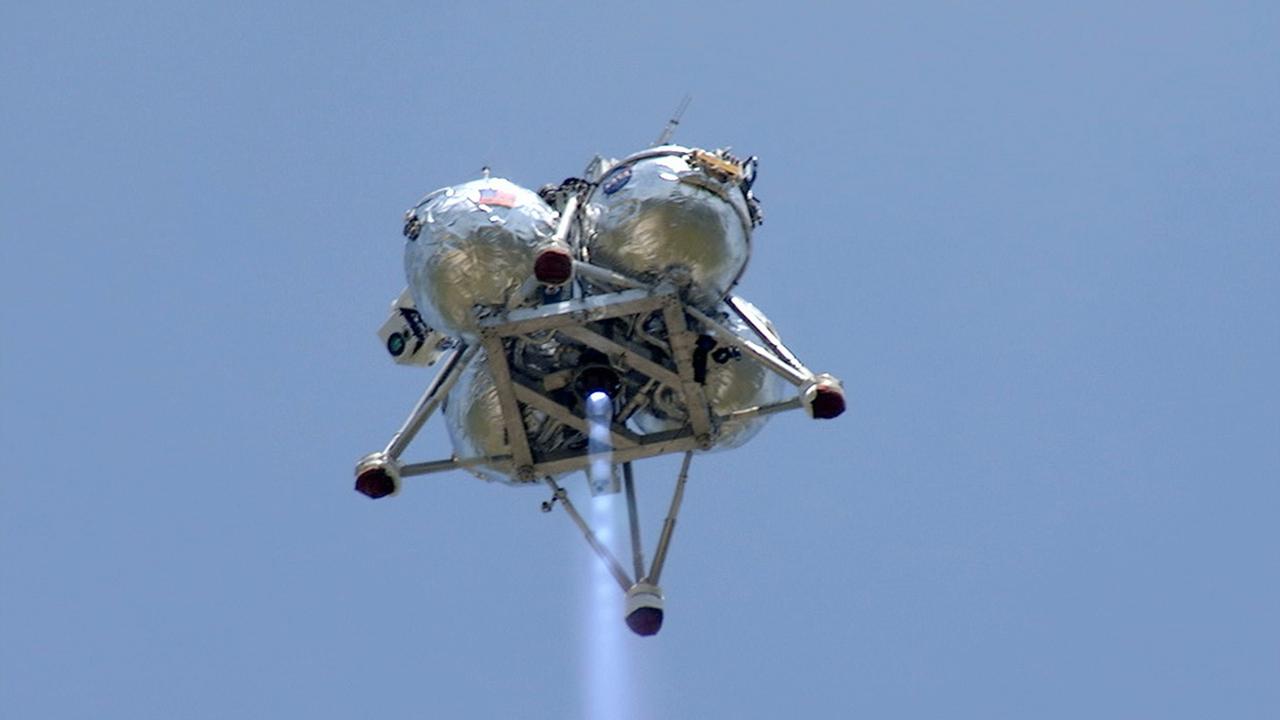 CAPE CANAVERAL, Fla. –NASA's Project Morpheus prototype lander performed a free-flight test from a launch pad at the north end of the Shuttle Landing Facility at NASA’s Kennedy Space Center in Florida. The 97-second test began at 2:30 p.m. EDT with the Morpheus lander launching from the ground over a flame trench and ascending more than 800 feet. The vehicle, with its recently installed autonomous landing and hazard avoidance technology, or ALHAT, sensors surveyed the hazard field to determine safe landing sites. Morpheus then flew forward and downward covering approximately 1,300 feet while performing a 78-foot divert to simulate a hazard avoidance maneuver. The lander descended and landed on a dedicated pad inside the ALHAT hazard field. Project Morpheus tests NASA’s ALHAT and an engine that runs on liquid oxygen and methane, which are green propellants. These new capabilities could be used in future efforts to deliver cargo to planetary surfaces. The landing facility provides the lander with the kind of field necessary for realistic testing, complete with rocks, craters and hazards to avoid. Morpheus’ ALHAT payload allows it to navigate to clear landing sites amidst rocks, craters and other hazards during its descent. Project Morpheus is being managed under the Advanced Exploration Systems, or AES, Division in NASA’s Human Exploration and Operations Mission Directorate. The efforts in AES pioneer new approaches for rapidly developing prototype systems, demonstrating key capabilities and validating operational concepts for future human missions beyond Earth orbit. For more information on Project Morpheus, visit http://morpheuslander.jsc.nasa.gov/. Photo credit: NASA/Mike Chambers and Chris Chamberland