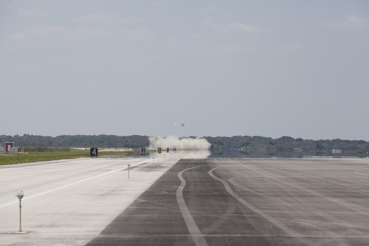 CAPE CANAVERAL, Fla. –NASA's Project Morpheus prototype lander performed a free-flight test from a launch pad at the north end of the Shuttle Landing Facility at NASA’s Kennedy Space Center in Florida. The 97-second test began at 2:30 p.m. EDT with the Morpheus lander launching from the ground over a flame trench and ascending more than 800 feet. The vehicle, with its recently installed autonomous landing and hazard avoidance technology, or ALHAT, sensors surveyed the hazard field to determine safe landing sites. Morpheus then flew forward and downward covering approximately 1,300 feet while performing a 78-foot divert to simulate a hazard avoidance maneuver. The lander descended and landed on a dedicated pad inside the ALHAT hazard field. Project Morpheus tests NASA’s ALHAT and an engine that runs on liquid oxygen and methane, which are green propellants. These new capabilities could be used in future efforts to deliver cargo to planetary surfaces.      The landing facility provides the lander with the kind of field necessary for realistic testing, complete with rocks, craters and hazards to avoid. Morpheus’ ALHAT payload allows it to navigate to clear landing sites amidst rocks, craters and other hazards during its descent. Project Morpheus is being managed under the Advanced Exploration Systems, or AES, Division in NASA’s Human Exploration and Operations Mission Directorate. The efforts in AES pioneer new approaches for rapidly developing prototype systems, demonstrating key capabilities and validating operational concepts for future human missions beyond Earth orbit. For more information on Project Morpheus, visit http://morpheuslander.jsc.nasa.gov/. Photo credit: NASA/Kim Shiflett