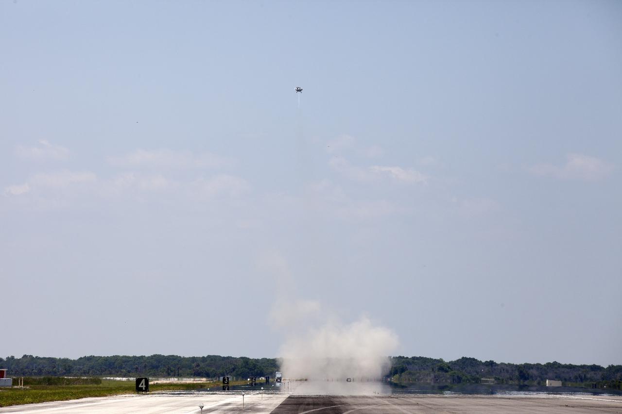 CAPE CANAVERAL, Fla. – NASA's Project Morpheus prototype lander performed a free-flight test from a launch pad at the north end of the Shuttle Landing Facility at NASA’s Kennedy Space Center in Florida. The 97-second test began at 2:30 p.m. EDT with the Morpheus lander launching from the ground over a flame trench and ascending more than 800 feet. The vehicle, with its recently installed autonomous landing and hazard avoidance technology, or ALHAT, sensors surveyed the hazard field to determine safe landing sites. Morpheus then flew forward and downward covering approximately 1,300 feet while performing a 78-foot divert to simulate a hazard avoidance maneuver. The lander descended and landed on a dedicated pad inside the ALHAT hazard field. Project Morpheus tests NASA’s ALHAT and an engine that runs on liquid oxygen and methane, which are green propellants. These new capabilities could be used in future efforts to deliver cargo to planetary surfaces. The landing facility provides the lander with the kind of field necessary for realistic testing, complete with rocks, craters and hazards to avoid. Morpheus’ ALHAT payload allows it to navigate to clear landing sites amidst rocks, craters and other hazards during its descent. Project Morpheus is being managed under the Advanced Exploration Systems, or AES, Division in NASA’s Human Exploration and Operations Mission Directorate. The efforts in AES pioneer new approaches for rapidly developing prototype systems, demonstrating key capabilities and validating operational concepts for future human missions beyond Earth orbit. For more information on Project Morpheus, visit http://morpheuslander.jsc.nasa.gov/. Photo credit: NASA/Kim Shiflett