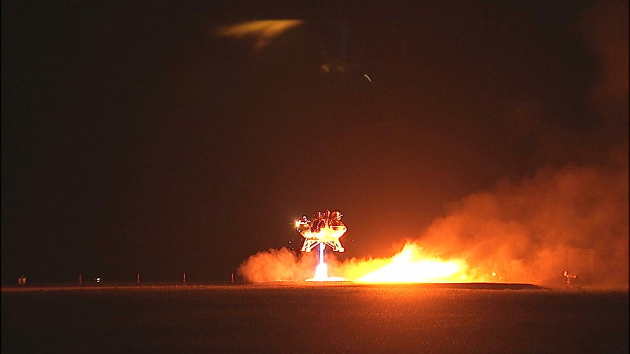 CAPE CANAVERAL, Fla. -- The first free-flight test of NASA's Morpheus prototype lander was conducted at the Shuttle Landing Facility at NASA's Kennedy Space Center in Florida. The 98-second test began at 10:02 p.m. EDT with the Morpheus lander launching from the ground over a flame trench and ascending more than 800 feet. The vehicle, with its autonomous landing and hazard avoidance technology, or ALHAT sensors, surveyed the hazard field to determine safe landing sites. Morpheus then flew forward and downward covering approximately 1,300 feet while performing a 78-foot divert to simulate a hazard avoidance maneuver. The lander then descended and landed on a dedicated pad inside the test field. Project Morpheus tests NASA’s ALHAT and an engine that runs on liquid oxygen and methane, which are green propellants. These new capabilities could be used in future efforts to deliver cargo to planetary surfaces. The landing facility provides the lander with the kind of field necessary for realistic testing, complete with rocks, craters and hazards to avoid. Morpheus’ ALHAT payload allows it to navigate to clear landing sites amidst rocks, craters and other hazards during its descent. Project Morpheus is being managed under the Advanced Exploration Systems, or AES, Division in NASA’s Human Exploration and Operations Mission Directorate. The efforts in AES pioneer new approaches for rapidly developing prototype systems, demonstrating key capabilities and validating operational concepts for future human missions beyond Earth orbit. For more information on Project Morpheus, visit http://morpheuslander.jsc.nasa.gov/. Photo credit: NASA/Mike Chambers