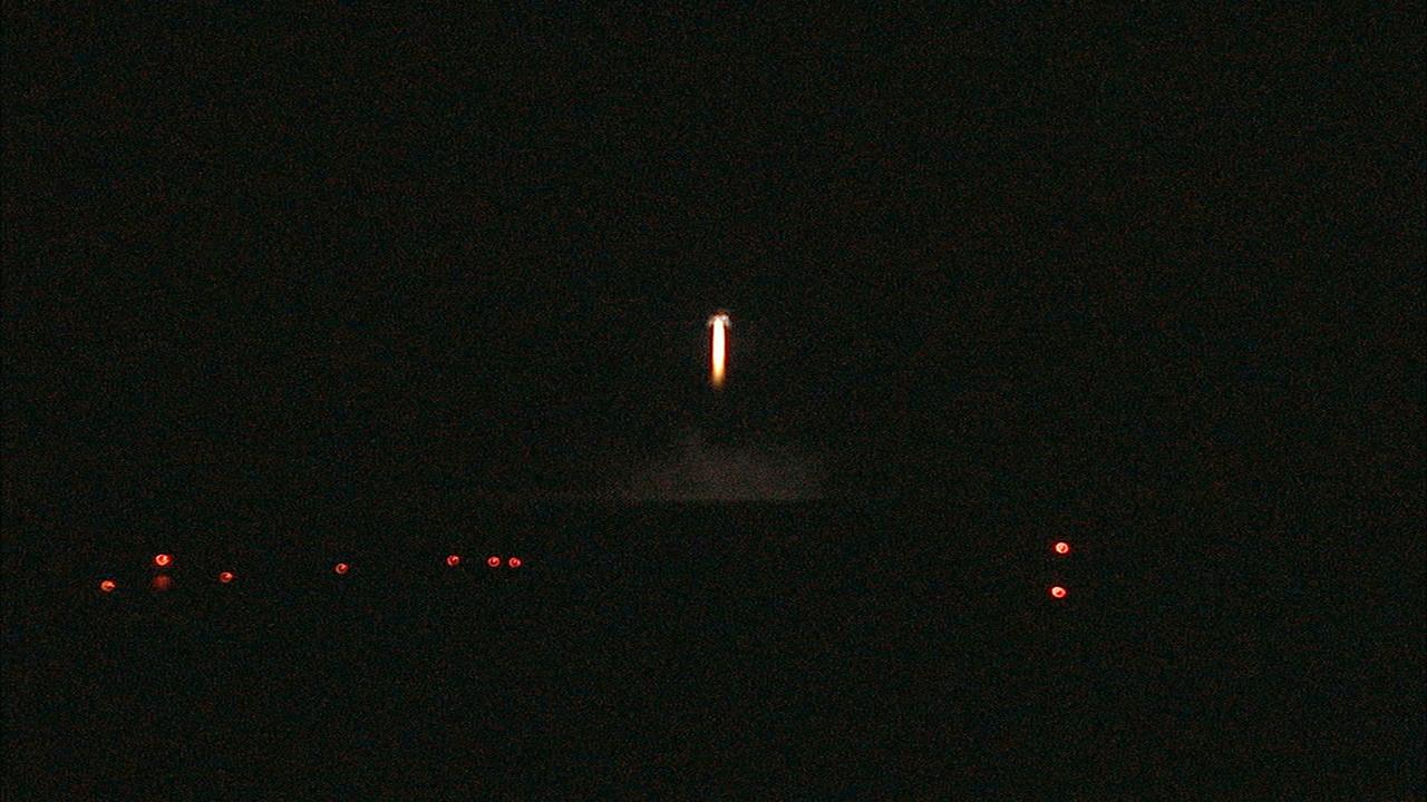 CAPE CANAVERAL, Fla. -- The first free-flight test of NASA's Morpheus prototype lander was conducted at the Shuttle Landing Facility at NASA's Kennedy Space Center in Florida. The 98-second test began at 10:02 p.m. EDT with the Morpheus lander launching from the ground over a flame trench and ascending more than 800 feet. The vehicle, with its autonomous landing and hazard avoidance technology, or ALHAT sensors, surveyed the hazard field to determine safe landing sites. Morpheus then flew forward and downward covering approximately 1,300 feet while performing a 78-foot divert to simulate a hazard avoidance maneuver. The lander then descended and landed on a dedicated pad inside the test field. Project Morpheus tests NASA’s ALHAT and an engine that runs on liquid oxygen and methane, which are green propellants. These new capabilities could be used in future efforts to deliver cargo to planetary surfaces. The landing facility provides the lander with the kind of field necessary for realistic testing, complete with rocks, craters and hazards to avoid. Morpheus’ ALHAT payload allows it to navigate to clear landing sites amidst rocks, craters and other hazards during its descent. Project Morpheus is being managed under the Advanced Exploration Systems, or AES, Division in NASA’s Human Exploration and Operations Mission Directorate. The efforts in AES pioneer new approaches for rapidly developing prototype systems, demonstrating key capabilities and validating operational concepts for future human missions beyond Earth orbit. For more information on Project Morpheus, visit http://morpheuslander.jsc.nasa.gov/. Photo credit: NASA/Mike Chambers