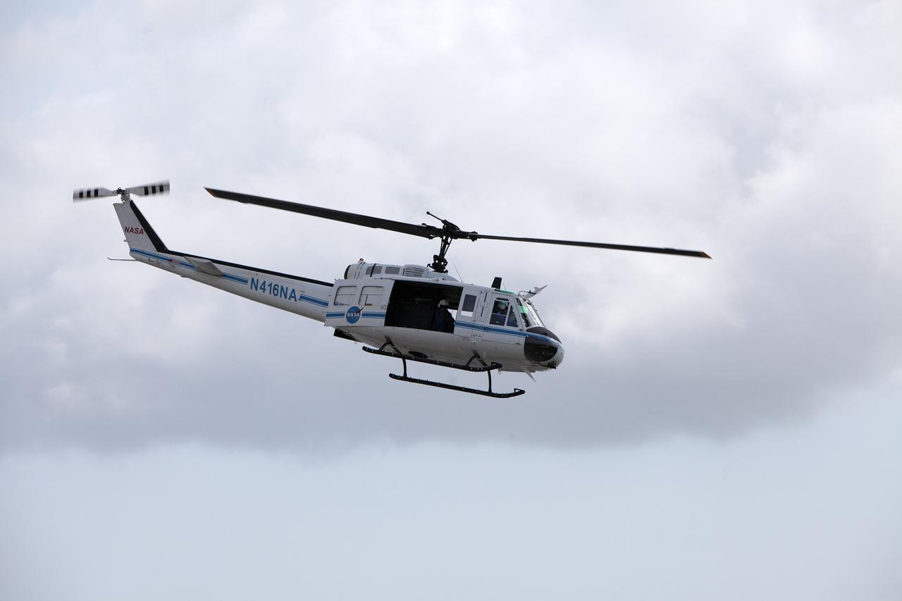 CAPE CANAVERAL, Fla. -- At NASA's Kennedy Space Center in Florida, agency helicopter takes off during a training exercise. The activity taking place in Kennedy's Launch Complex 39 turn-basin parking lot was only one of several drills. It was part of a new training program that was developed by Kennedy's Fire Rescue department along with NASA Aircraft Operations to sharpen the skills needed to help rescue personnel learn how to collaborate with helicopter pilots in taking injured patients to hospitals as quickly as possible. Photo credit: NASA/Dan Casper