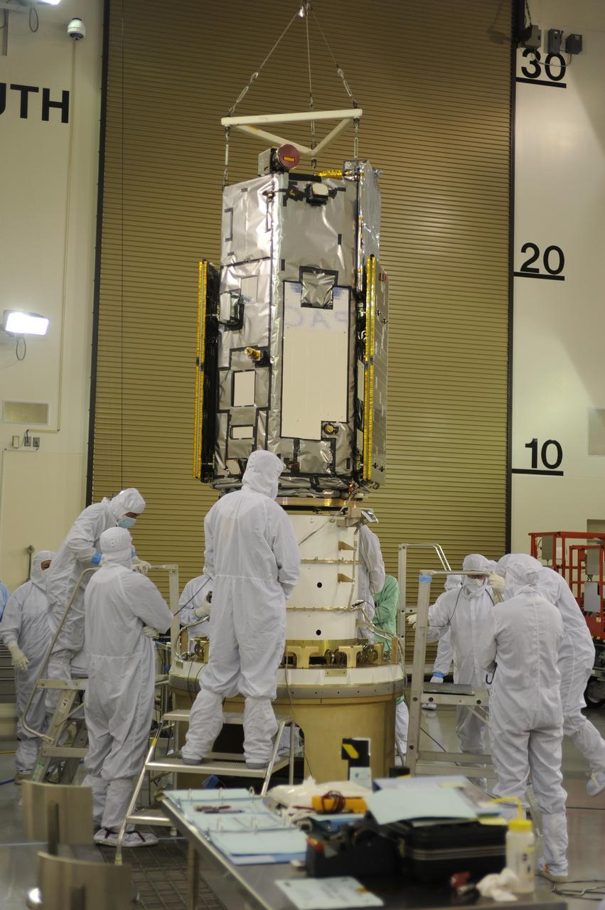 VANDENBERG AIR FORCE BASE, Calif. – Preparations are underway to attach NASA's Orbiting Carbon Observatory-2, or OCO-2, to the payload attach system inside a clean room in the Astrotech Payload Processing Facility at Vandenberg Air Force Base in California.    Launch aboard a United Launch Alliance Delta II rocket is scheduled for July 1, 2014, from Space Launch Complex 2.  The observatory will collect precise global measurements of carbon dioxide in the Earth's atmosphere and provide scientists with a better idea of the chemical compound's impacts on climate change. Scientists will analyze this data to improve our understanding of the natural processes and human activities that regulate the abundance and distribution of this important atmospheric gas. To learn more about OCO-2, visit http://oco.jpl.nasa.gov.  Photo credit: NASA/U. S. Air Force 30th Space Wing