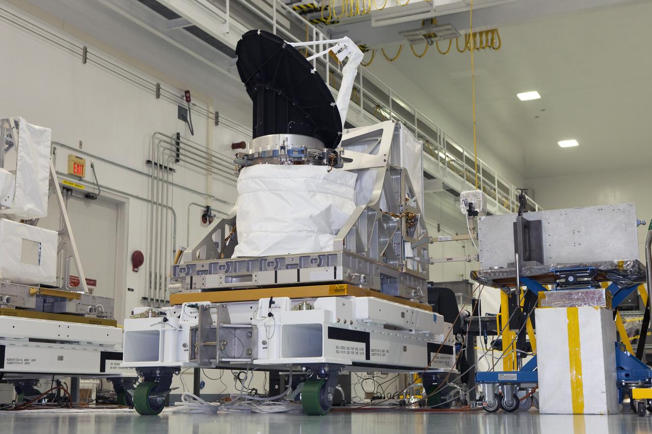 CAPE CANAVERAL, Fla. – NASA's International Space Station-RapidScat undergoes testing of its rotating radar antenna in the Space Station Processing Facility at NASA's Kennedy Space Center in Florida. Built at NASA's Jet Propulsion Laboratory JPL in California, the radar scatterometer is the first scientific Earth-observing instrument designed to operate from the exterior of the space station. It will measure Earth's ocean surface wind speed and direction, providing data to be used in weather and marine forecasting. ISS-RapidScat will be delivered to the station on the SpaceX-4 commercial cargo resupply flight targeted for August 2014. For more information, visit http://www.jpl.nasa.gov/missions/iss-rapidscat. Photo credit: NASA/Daniel Casper
