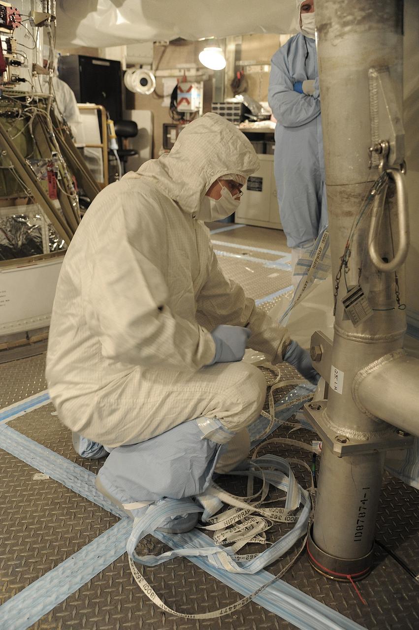 VANDENBERG AIR FORCE BASE, Calif. – In the mobile service tower at Space Launch Complex 2 at Vandenberg Air Force Base in California, technicians are inspecting the NASA's Orbiting Carbon Observatory-2, or OCO-2, satellite. The task is taking place prior to encapsulation in its payload fairing atop a United Launch Alliance Delta II rocket. Launch is scheduled for 2:56 a.m. PDT 5:56 a.m. EDT on July 1.      OCO-2 is NASA’s first mission dedicated to studying atmospheric carbon dioxide, the leading human-produced greenhouse gas driving changes in Earth’s climate. OCO-2 will provide a new tool for understanding the human and natural sources of carbon dioxide emissions and the natural "sinks" that absorb carbon dioxide and help control its buildup. The observatory will measure the global geographic distribution of these sources and sinks and study their changes over time. To learn more about OCO-2, visit http://oco.jpl.nasa.gov Photo credit: NASA/Mark Mackley