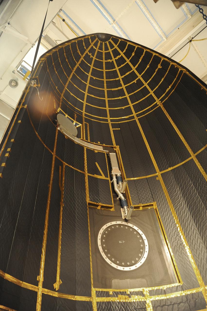 VANDENBERG AIR FORCE BASE, Calif. – In the mobile service tower at Space Launch Complex 2 at Vandenberg Air Force Base in California, the payload fairing for NASA's Orbiting Carbon Observatory-2, or OCO-2, satellite is being prepared for encapsulation atop a United Launch Alliance Delta II rocket. Launch is scheduled for 2:56 a.m. PDT 5:56 a.m. EDT on July 1.      OCO-2 is NASA’s first mission dedicated to studying atmospheric carbon dioxide, the leading human-produced greenhouse gas driving changes in Earth’s climate. OCO-2 will provide a new tool for understanding the human and natural sources of carbon dioxide emissions and the natural "sinks" that absorb carbon dioxide and help control its buildup. The observatory will measure the global geographic distribution of these sources and sinks and study their changes over time. To learn more about OCO-2, visit http://oco.jpl.nasa.gov Photo credit: NASA/Mark Mackley