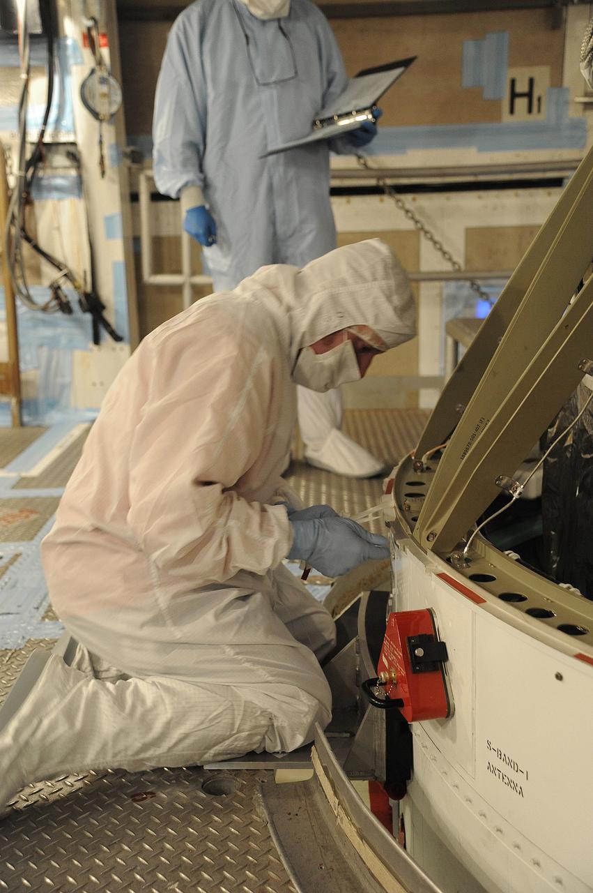 VANDENBERG AIR FORCE BASE, Calif. – In the mobile service tower at Space Launch Complex 2 at Vandenberg Air Force Base in California, technicians are inspecting the NASA's Orbiting Carbon Observatory-2, or OCO-2, satellite. The task is taking place prior to encapsulation in its payload fairing atop a United Launch Alliance Delta II rocket. Launch is scheduled for 2:56 a.m. PDT 5:56 a.m. EDT on July 1.        OCO-2 is NASA’s first mission dedicated to studying atmospheric carbon dioxide, the leading human-produced greenhouse gas driving changes in Earth’s climate. OCO-2 will provide a new tool for understanding the human and natural sources of carbon dioxide emissions and the natural "sinks" that absorb carbon dioxide and help control its buildup. The observatory will measure the global geographic distribution of these sources and sinks and study their changes over time. To learn more about OCO-2, visit http://oco.jpl.nasa.gov Photo credit: NASA/Mark Mackley