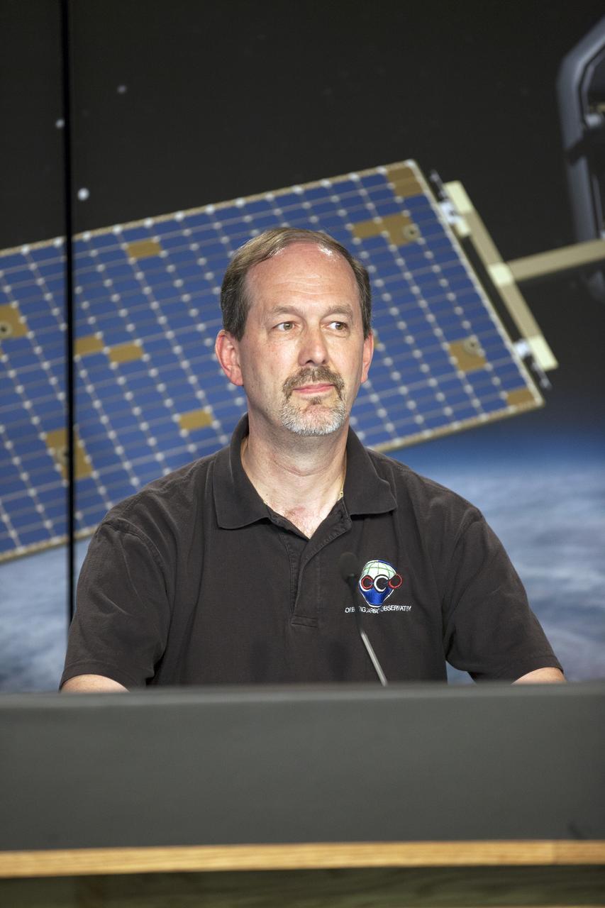 VANDENBERG AIR FORCE BASE, Calif. – Ken Jucks, Orbiting Carbon Observatory-2 project executive at NASA Headquarters, participates in a mission science briefing at Vandenberg Air Force Base in California prior to the launch of the observatory, or OCO-2.    Launch aboard a United Launch Alliance Delta II rocket from Space Launch Complex 2 is scheduled for 5:56 a.m. EDT on July 1.  OCO-2 is NASA’s first mission dedicated to studying atmospheric carbon dioxide, the leading human-produced greenhouse gas driving changes in Earth’s climate. OCO-2 will provide a new tool for understanding the human and natural sources of carbon dioxide emissions and the natural "sinks" that absorb carbon dioxide and help control its buildup. The observatory will measure the global geographic distribution of these sources and sinks and study their changes over time. To learn more about OCO-2, visit http://www.nasa.gov/oco2.  Photo credit: NASA/Kim Shiflett