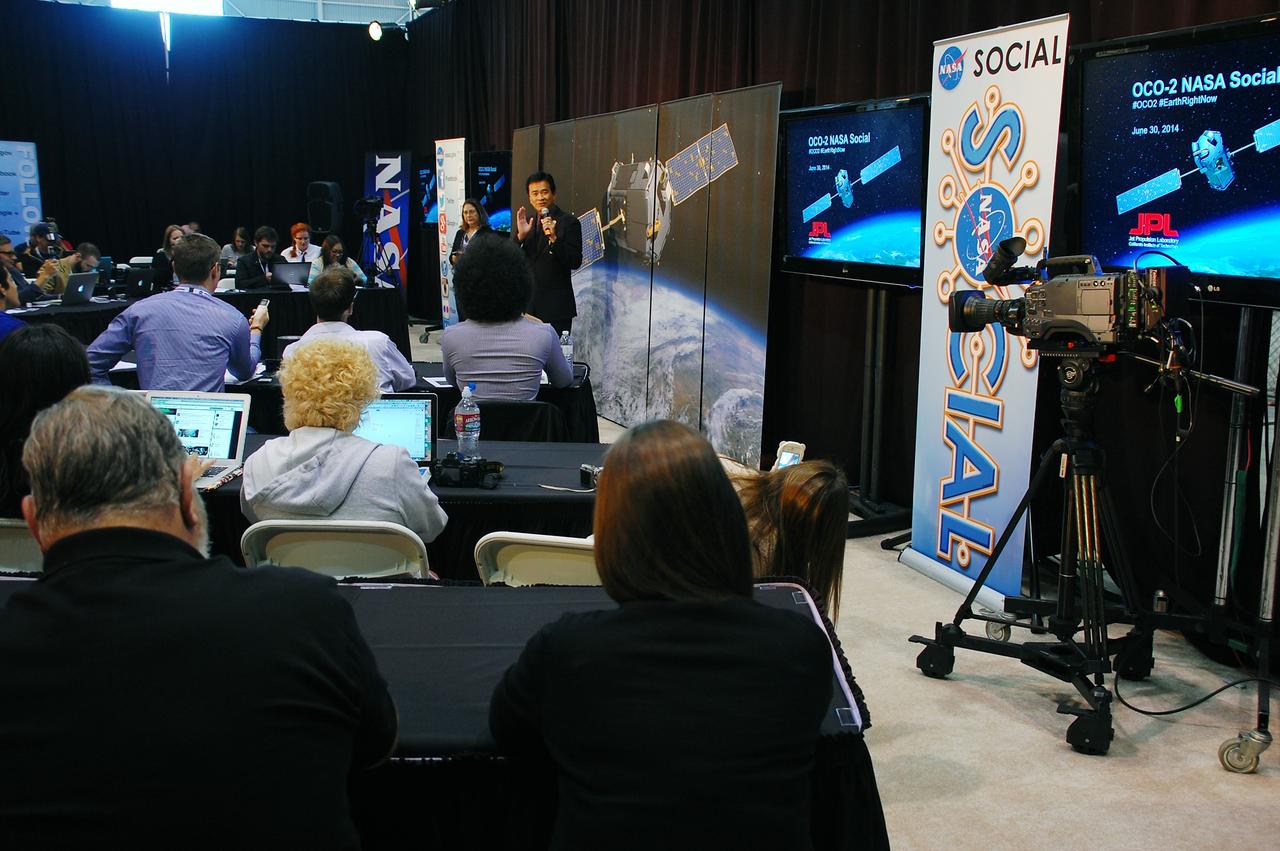 VANDENBERG AIR FORCE BASE, Calif. – Ralph Basilio, project manager for NASA's Orbiting Carbon Observatory-2 at NASA's Jet Propulsion Laboratory, briefs representatives of social media outlets on the observatory, or OCO-2, at a NASA Social held on Vandenberg Air Force Base in California. Launch of OCO-2 aboard a United Launch Alliance Delta II rocket from Space Launch Complex 2 is scheduled for 5:56 a.m. EDT on July 1. The social media users selected to attend the two-day event on June 30 and July 1 are given the same access as news media in an effort to align their experience with those of traditional media. OCO-2 is NASA’s first mission dedicated to studying atmospheric carbon dioxide, the leading human-produced greenhouse gas driving changes in Earth’s climate. OCO-2 will provide a new tool for understanding the human and natural sources of carbon dioxide emissions and the natural "sinks" that absorb carbon dioxide and help control its buildup. The observatory will measure the global geographic distribution of these sources and sinks and study their changes over time. To learn more about OCO-2, visit http://www.nasa.gov/oco2. Photo credit: NASA/Ben Smegelsky