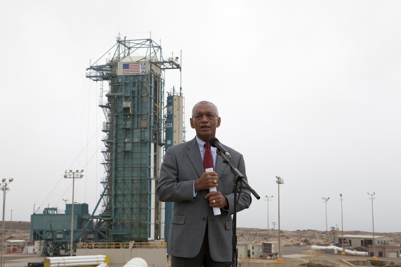 VANDENBERG AIR FORCE BASE, Calif. – NASA Administrator Charles Bolden talks with representatives of the news media at Space Launch Complex 2 on Vandenberg Air Force Base in California during activities leading up to the launch of NASA's Orbiting Carbon Observatory-2, or OCO-2.    Final preparations for launch of OCO-2 at 5:56 a.m. EDT on July 1 aboard a United Launch Alliance Delta II rocket are underway on the pad.  OCO-2 is NASA’s first mission dedicated to studying atmospheric carbon dioxide, the leading human-produced greenhouse gas driving changes in Earth’s climate. OCO-2 will provide a new tool for understanding the human and natural sources of carbon dioxide emissions and the natural "sinks" that absorb carbon dioxide and help control its buildup. The observatory will measure the global geographic distribution of these sources and sinks and study their changes over time. To learn more about OCO-2, visit http://www.nasa.gov/oco2.  Photo credit: NASA/Ben Smegelsky