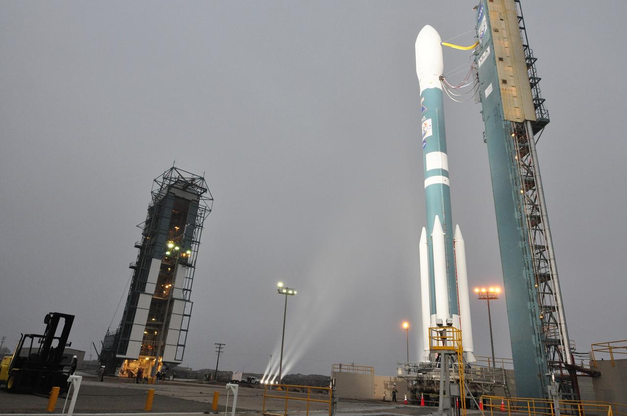 VANDENBERG AIR FORCE BASE, Calif. – The United Launch Alliance Delta II rocket carrying NASA's Orbiting Carbon Observatory-2, or OCO-2, is illuminated on Space Launch Complex 2 on Vandenberg Air Force Base in California following rollback of the mobile service tower.    Launch is scheduled for 5:56 a.m. EDT on July 1. OCO-2 is NASA’s first mission dedicated to studying atmospheric carbon dioxide, the leading human-produced greenhouse gas driving changes in Earth’s climate. OCO-2 will provide a new tool for understanding the human and natural sources of carbon dioxide emissions and the natural "sinks" that absorb carbon dioxide and help control its buildup. The observatory will measure the global geographic distribution of these sources and sinks and study their changes over time. To learn more about OCO-2, visit http://www.nasa.gov/oco2.  Photo credit: NASA/Randy Beaudoin