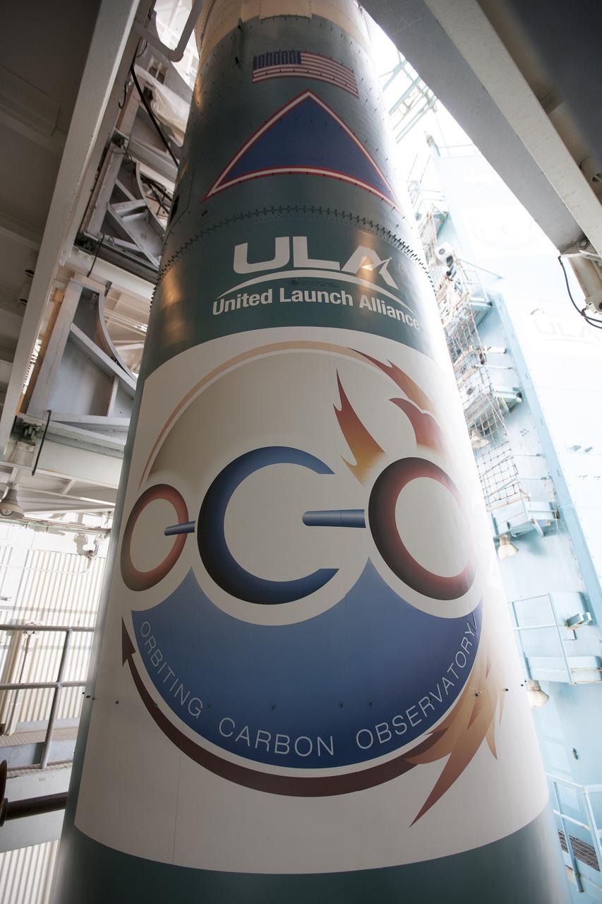 VANDENBERG AIR FORCE BASE, Calif. – Logos affixed to the United Launch Alliance Delta II rocket in the mobile service tower on Space Launch Complex 2 at Vandenberg Air Force Base in California identify the major participants in the upcoming launch. The rocket will be carrying NASA's Orbiting Carbon Observatory-2, or OCO-2, to orbit.    Launch is scheduled for 5:56 a.m. EDT on July 1. OCO-2 is NASA’s first mission dedicated to studying atmospheric carbon dioxide, the leading human-produced greenhouse gas driving changes in Earth’s climate. OCO-2 will provide a new tool for understanding the human and natural sources of carbon dioxide emissions and the natural "sinks" that absorb carbon dioxide and help control its buildup. The observatory will measure the global geographic distribution of these sources and sinks and study their changes over time. To learn more about OCO-2, visit http://www.nasa.gov/oco2.  Photo credit: NASA/Kim Shiflett