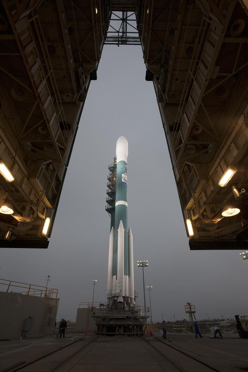 VANDENBERG AIR FORCE BASE, Calif. – NASA's Orbiting Carbon Observatory-2, or OCO-2, stands ready for launch aboard a United Launch Alliance Delta II rocket following rollback of the mobile service tower on Space Launch Complex 2 on Vandenberg Air Force Base in California.     Launch is scheduled for 5:56 a.m. EDT on July 1. OCO-2 is NASA’s first mission dedicated to studying atmospheric carbon dioxide, the leading human-produced greenhouse gas driving changes in Earth’s climate. OCO-2 will provide a new tool for understanding the human and natural sources of carbon dioxide emissions and the natural "sinks" that absorb carbon dioxide and help control its buildup. The observatory will measure the global geographic distribution of these sources and sinks and study their changes over time. To learn more about OCO-2, visit http://www.nasa.gov/oco2.  Photo credit: NASA/Kim Shiflett