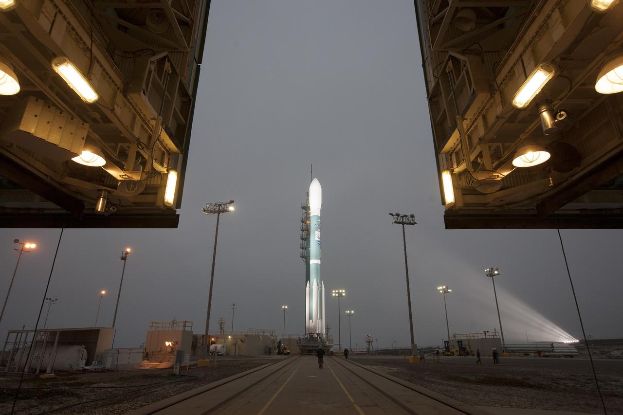 VANDENBERG AIR FORCE BASE, Calif. – The United Launch Alliance Delta II rocket carrying NASA's Orbiting Carbon Observatory-2, or OCO-2, is illuminated on Space Launch Complex 2 on Vandenberg Air Force Base in California following rollback of the mobile service tower.    Launch is scheduled for 5:56 a.m. EDT on July 1. OCO-2 is NASA’s first mission dedicated to studying atmospheric carbon dioxide, the leading human-produced greenhouse gas driving changes in Earth’s climate. OCO-2 will provide a new tool for understanding the human and natural sources of carbon dioxide emissions and the natural "sinks" that absorb carbon dioxide and help control its buildup. The observatory will measure the global geographic distribution of these sources and sinks and study their changes over time. To learn more about OCO-2, visit http://www.nasa.gov/oco2.  Photo credit: NASA/Kim Shiflett