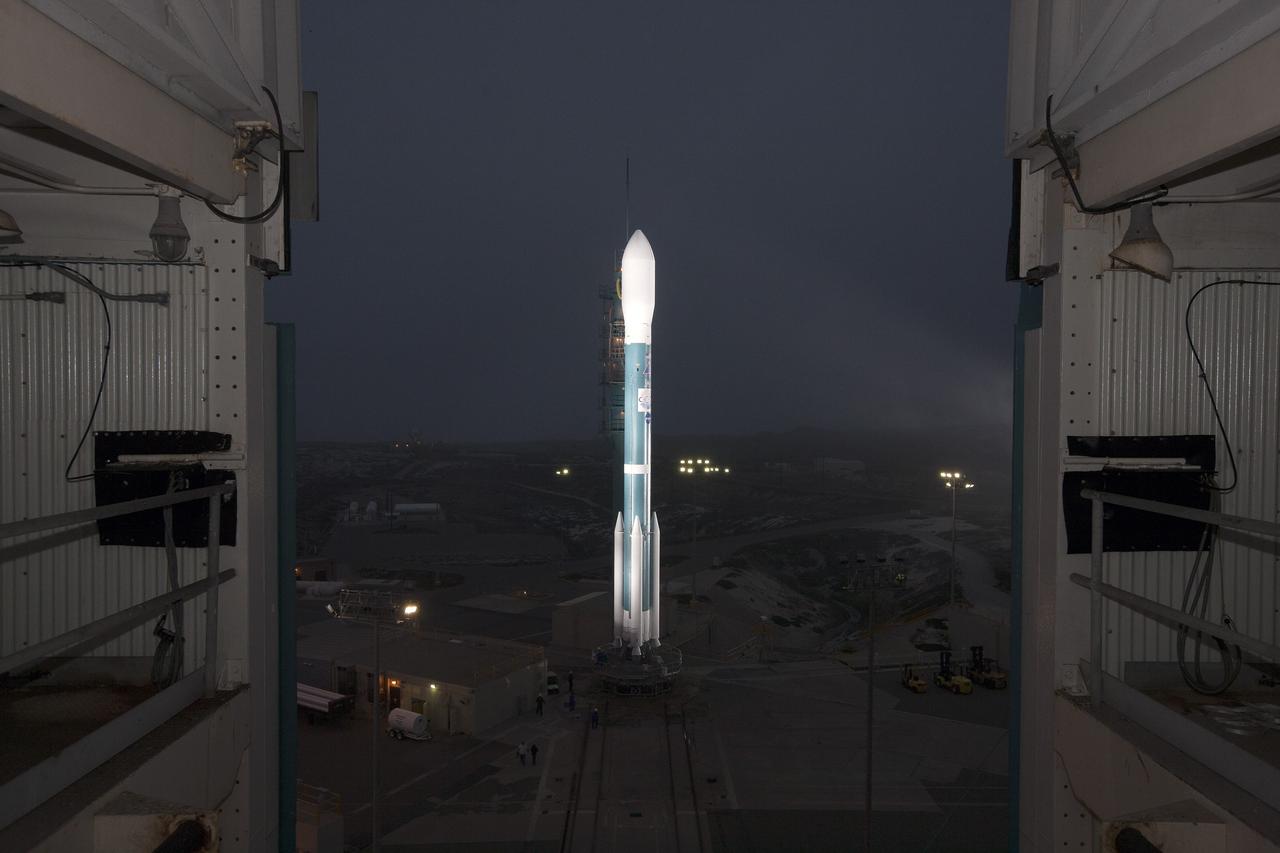 VANDENBERG AIR FORCE BASE, Calif. – The mobile service tower has been rolled back from the United Launch Alliance Delta II rocket carrying NASA's Orbiting Carbon Observatory-2, or OCO-2, on Space Launch Complex 2 at Vandenberg Air Force Base in California, one of the final steps leading up to launch.    Launch is scheduled for 5:56 a.m. EDT on July 1. OCO-2 is NASA’s first mission dedicated to studying atmospheric carbon dioxide, the leading human-produced greenhouse gas driving changes in Earth’s climate. OCO-2 will provide a new tool for understanding the human and natural sources of carbon dioxide emissions and the natural "sinks" that absorb carbon dioxide and help control its buildup. The observatory will measure the global geographic distribution of these sources and sinks and study their changes over time. To learn more about OCO-2, visit http://www.nasa.gov/oco2.  Photo credit: NASA/Kim Shiflett