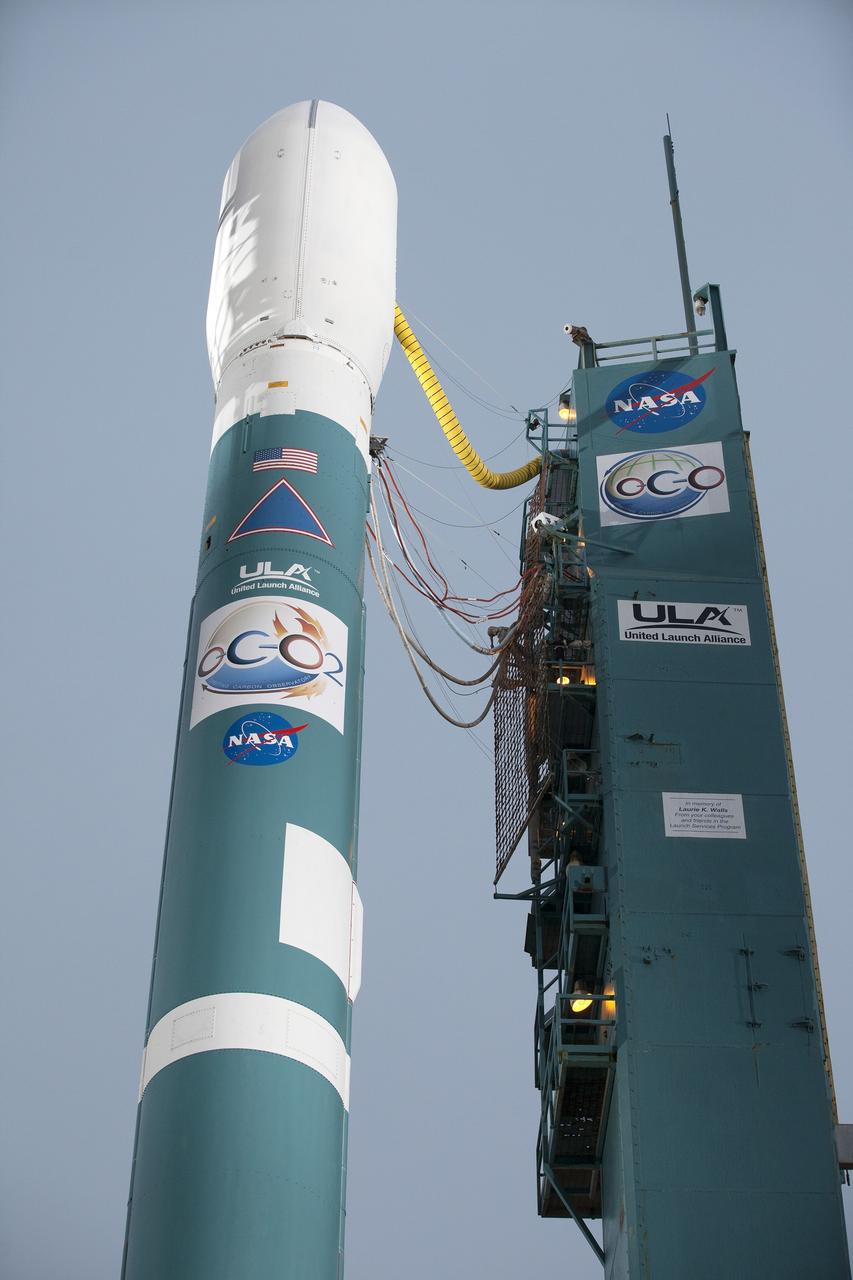 VANDENBERG AIR FORCE BASE, Calif. – At Vandenberg Air Force Base in California, the United Launch Alliance Delta II rocket carrying NASA's Orbiting Carbon Observatory-2, or OCO-2, awaits loading of its cryogenic propellants following rollback of the mobile service tower on Space Launch Complex 2.    Launch is scheduled for 5:56 a.m. EDT on July 1. OCO-2 is NASA’s first mission dedicated to studying atmospheric carbon dioxide, the leading human-produced greenhouse gas driving changes in Earth’s climate. OCO-2 will provide a new tool for understanding the human and natural sources of carbon dioxide emissions and the natural "sinks" that absorb carbon dioxide and help control its buildup. The observatory will measure the global geographic distribution of these sources and sinks and study their changes over time. To learn more about OCO-2, visit http://www.nasa.gov/oco2.  Photo credit: NASA/Kim Shiflett