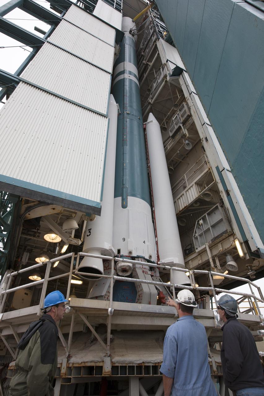 VANDENBERG AIR FORCE BASE, Calif. – Technicians prepare to roll the mobile service tower away from the United Launch Alliance Delta II rocket carrying NASA's Orbiting Carbon Observatory-2, or OCO-2, at Space Launch Complex 2 on Vandenberg Air Force Base in California.    Launch of OCO-2 is scheduled for 5:56 a.m. EDT on July 2 following the repair of the pad's water suppression system, which failed on the first launch attempt July 1. OCO-2 is NASA’s first mission dedicated to studying atmospheric carbon dioxide, the leading human-produced greenhouse gas driving changes in Earth’s climate. OCO-2 will provide a new tool for understanding the human and natural sources of carbon dioxide emissions and the natural "sinks" that absorb carbon dioxide and help control its buildup. The observatory will measure the global geographic distribution of these sources and sinks and study their changes over time. To learn more about OCO-2, visit http://www.nasa.gov/oco2.  Photo credit: NASA/Kim Shiflett
