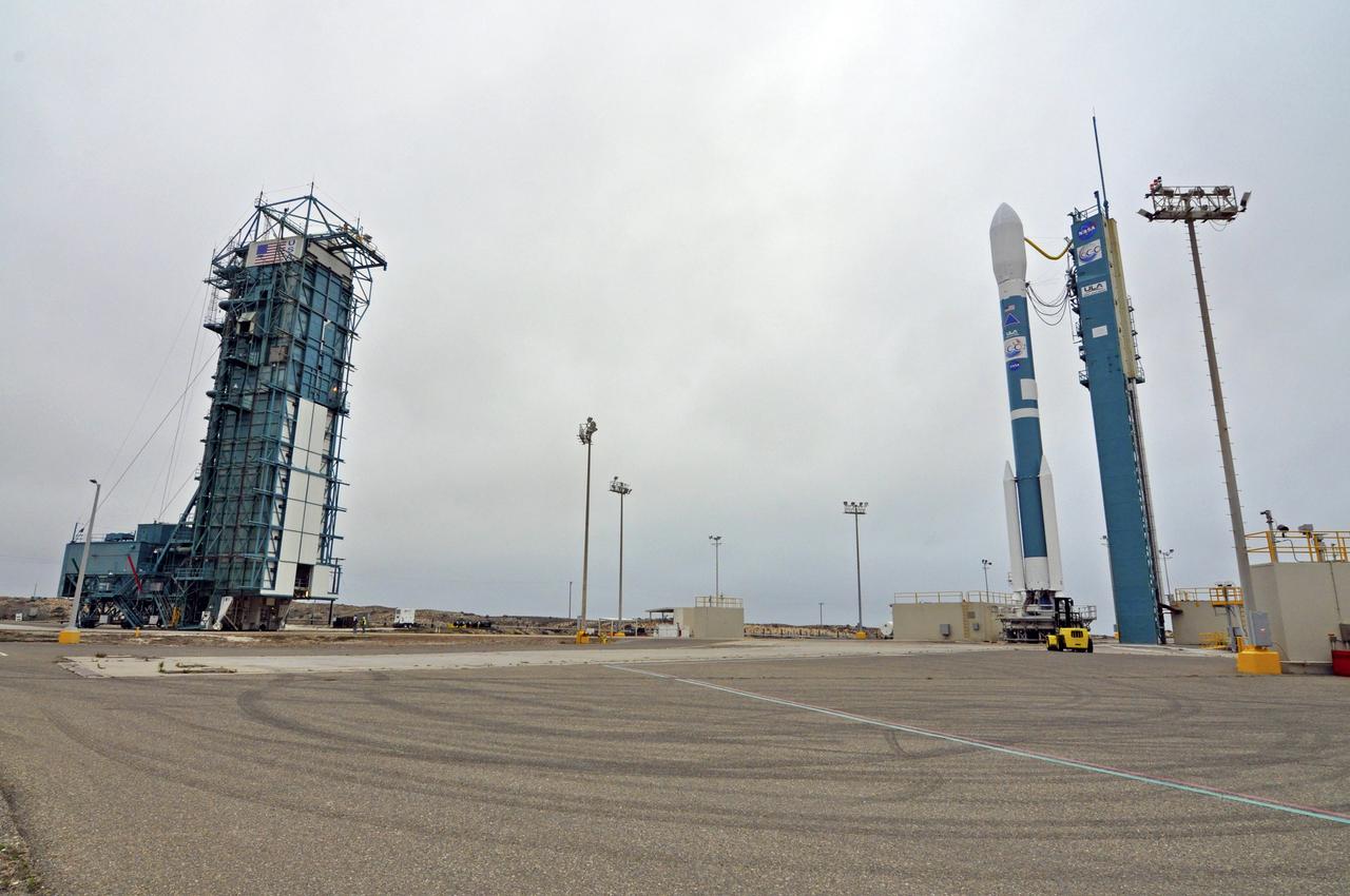 VANDENBERG AIR FORCE BASE, Calif. – NASA's Orbiting Carbon Observatory-2, or OCO-2, stands ready for launch aboard a United Launch Alliance Delta II rocket following rollback of the mobile service tower on Space Launch Complex 2 on Vandenberg Air Force Base in California. Launch of OCO-2 is scheduled for 5:56 a.m. EDT on July 2 following the repair of the pad's water suppression system, which failed on the first launch attempt July 1. OCO-2 is NASA’s first mission dedicated to studying atmospheric carbon dioxide, the leading human-produced greenhouse gas driving changes in Earth’s climate. OCO-2 will provide a new tool for understanding the human and natural sources of carbon dioxide emissions and the natural "sinks" that absorb carbon dioxide and help control its buildup. The observatory will measure the global geographic distribution of these sources and sinks and study their changes over time. To learn more about OCO-2, visit http://www.nasa.gov/oco2. Photo credit: NASA/Randy Beaudoin