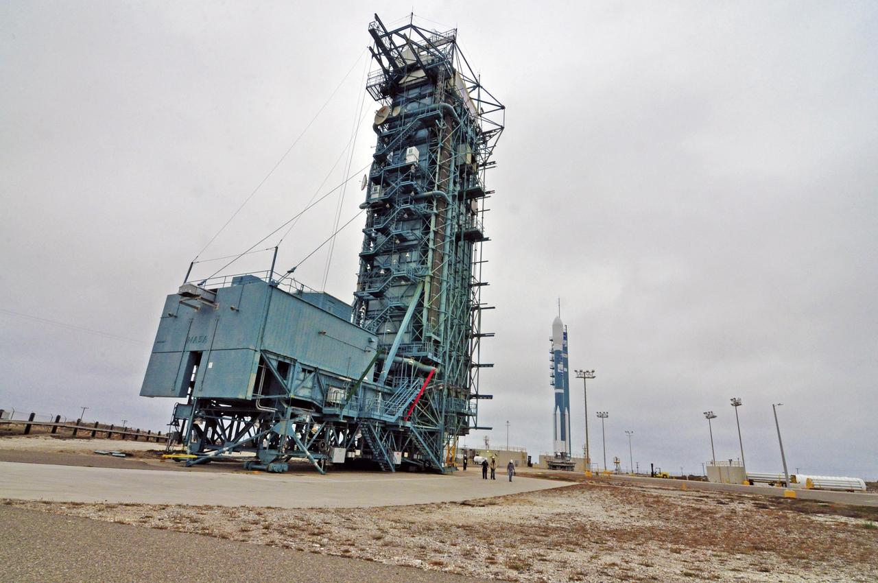 VANDENBERG AIR FORCE BASE, Calif. – Final preparations are underway for liftoff of NASA's Orbiting Carbon Observatory-2, or OCO-2, aboard a United Launch Alliance Delta II rocket, following rollback of the mobile service tower on Space Launch Complex 2 on Vandenberg Air Force Base in California.     Launch of OCO-2 is scheduled for 5:56 a.m. EDT on July 2 following the repair of the pad's water suppression system, which failed on the first launch attempt July 1. OCO-2 is NASA’s first mission dedicated to studying atmospheric carbon dioxide, the leading human-produced greenhouse gas driving changes in Earth’s climate. OCO-2 will provide a new tool for understanding the human and natural sources of carbon dioxide emissions and the natural "sinks" that absorb carbon dioxide and help control its buildup. The observatory will measure the global geographic distribution of these sources and sinks and study their changes over time. To learn more about OCO-2, visit http://www.nasa.gov/oco2.  Photo credit: NASA/Randy Beaudoin