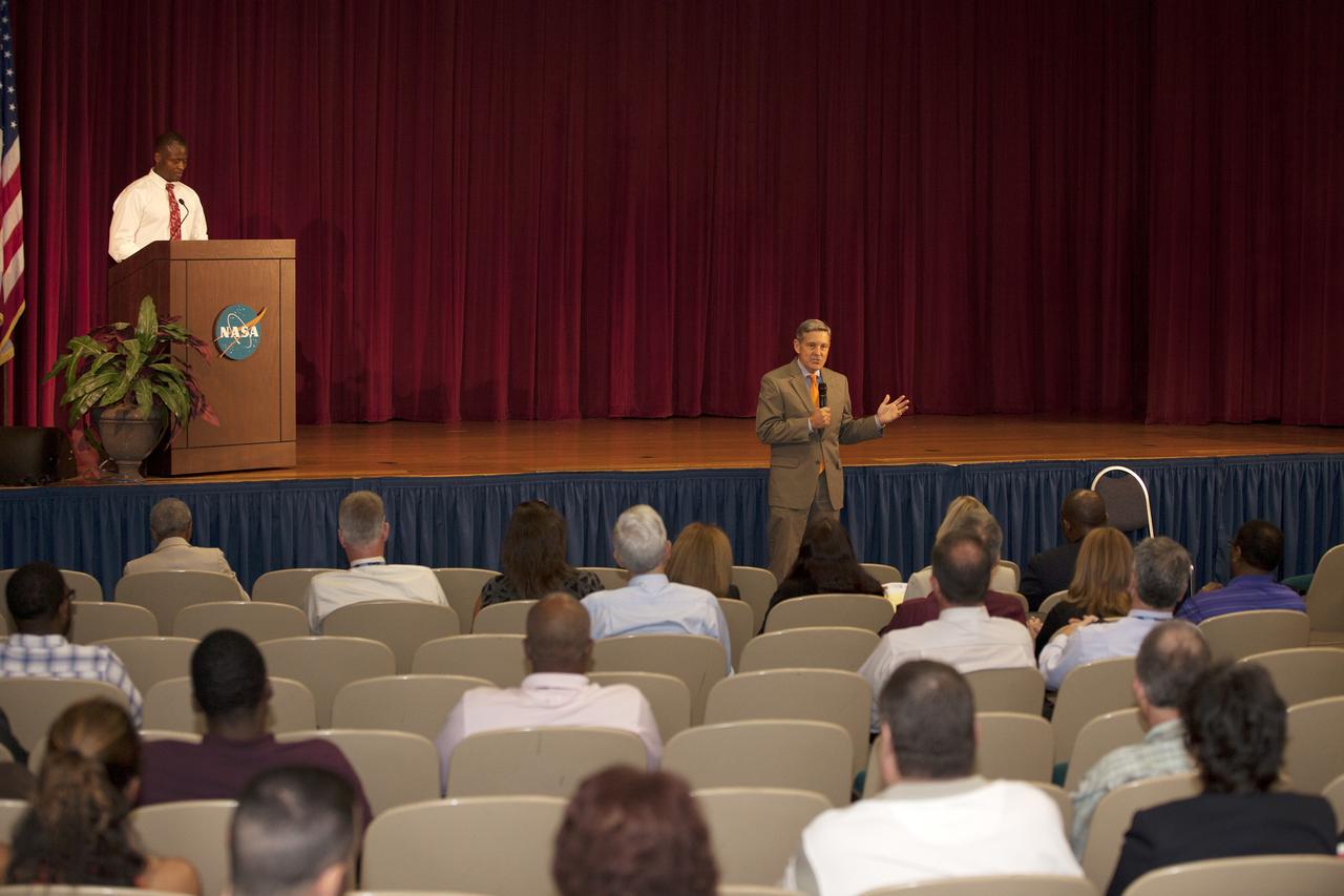 CAPE CANAVERAL, Fla. -- In the KSC Training Auditorium at NASA's Kennedy Space Center in Florida, Center Director Robert Cabana addresses the audience at a special event marking the 50th anniversary of the Civil Rights Act of 1964. Yves Lamothe, on stage, transition manager for the Ground Systems Development and Operations Program, was the master of ceremonies.    Dr. Mary Frances Berry, an award-winning civil rights activist and former member of the U.S. Commission on Civil Rights, was the guest speaker. The event was presented by Kennedy's Office of Diversity and Equal Opportunity. For more information on Kennedy Space Center, visit http://www.nasa.gov/kennedy. Photo credit: NASA/Kim Shiflett
