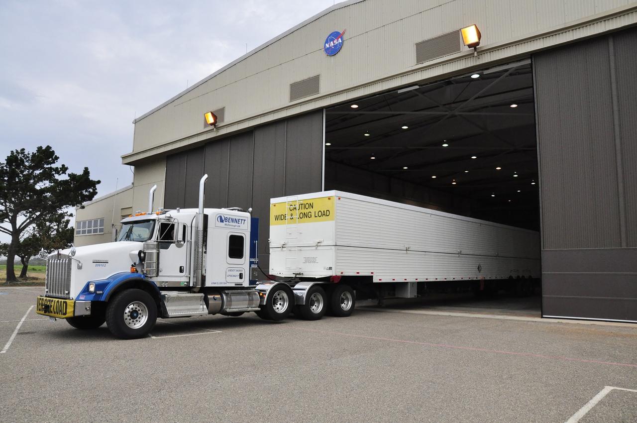 VANDENBERG AIR FORCE BASE, Calif. – The second stage, or upper stage, of a United Launch Alliance Delta II rocket arrives at the Building 836 hangar on south Vandenberg Air Force Base in California. The Delta II rocket will be used to deliver NASA's Soil Moisture Active Passive mission, or SMAP, into orbit from Vandenberg's Space Launch Complex 2. SMAP will provide global measurements of soil moisture and its freeze/thaw state. These measurements will be used to enhance understanding of processes that link the water, energy and carbon cycles, and to extend the capabilities of weather and climate prediction models. SMAP data also will be used to quantify net carbon flux in boreal landscapes and to develop improved flood prediction and drought monitoring capabilities. Launch is scheduled for November 2014. To learn more about SMAP, visit http://smap.jpl.nasa.gov. Photo credit: NASA/Randy Beaudoin