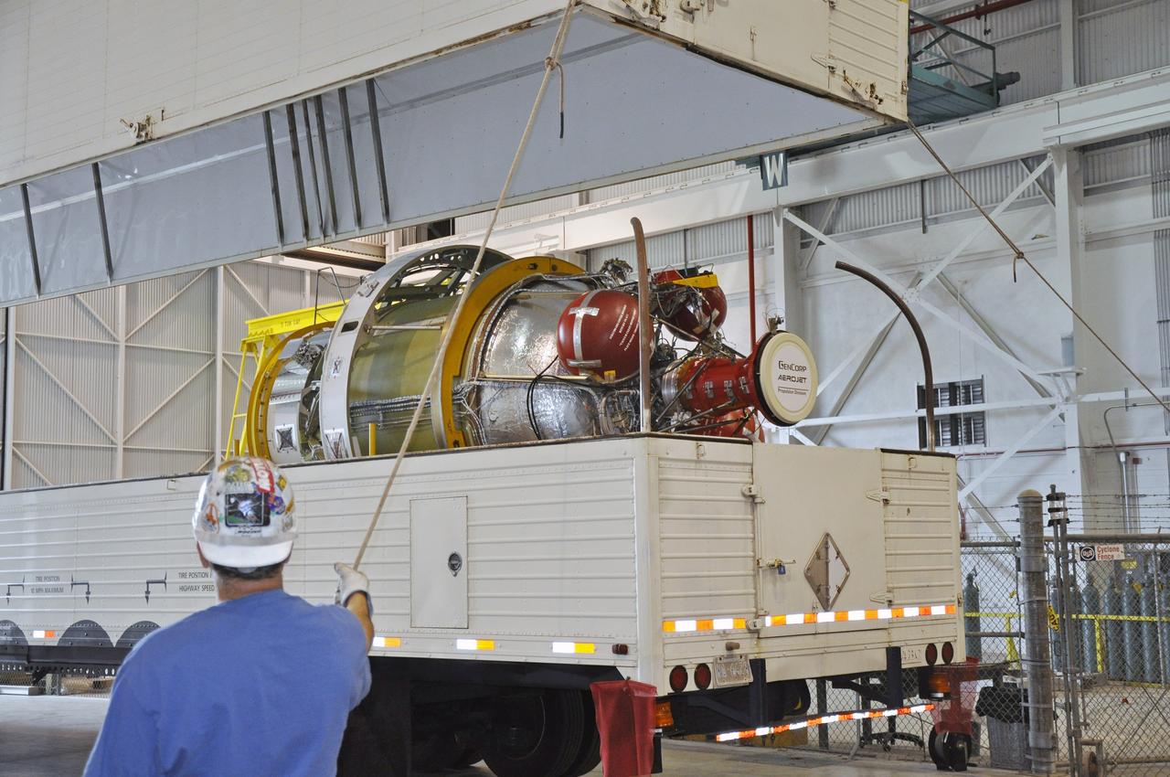 VANDENBERG AIR FORCE BASE, Calif. – The lid is removed from the transportation trailer containing the second stage, or upper stage, of a United Launch Alliance Delta II rocket in the Building 836 hangar on south Vandenberg Air Force Base in California. The Delta II rocket will be used to deliver NASA's Soil Moisture Active Passive mission, or SMAP, into orbit from Vandenberg's Space Launch Complex 2. SMAP will provide global measurements of soil moisture and its freeze/thaw state. These measurements will be used to enhance understanding of processes that link the water, energy and carbon cycles, and to extend the capabilities of weather and climate prediction models. SMAP data also will be used to quantify net carbon flux in boreal landscapes and to develop improved flood prediction and drought monitoring capabilities. Launch is scheduled for November 2014. To learn more about SMAP, visit http://smap.jpl.nasa.gov. Photo credit: NASA/Randy Beaudoin