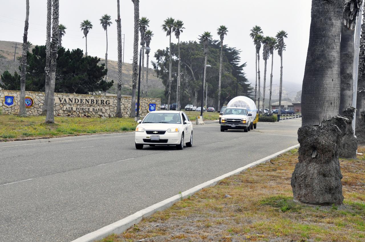VANDENBERG AIR FORCE BASE, Calif. – The second stage, or upper stage, of a United Launch Alliance Delta II rocket begins its journey from Building 836 on south Vandenberg Air Force Base in California to the Horizontal Processing Facility at Space Launch Complex 2. The Delta II rocket will be used to deliver NASA's Soil Moisture Active Passive mission, or SMAP, into orbit. SMAP will provide global measurements of soil moisture and its freeze/thaw state. These measurements will be used to enhance understanding of processes that link the water, energy and carbon cycles, and to extend the capabilities of weather and climate prediction models. SMAP data also will be used to quantify net carbon flux in boreal landscapes and to develop improved flood prediction and drought monitoring capabilities. Launch is scheduled for November 2014. To learn more about SMAP, visit http://smap.jpl.nasa.gov. Photo credit: NASA/Randy Beaudoin