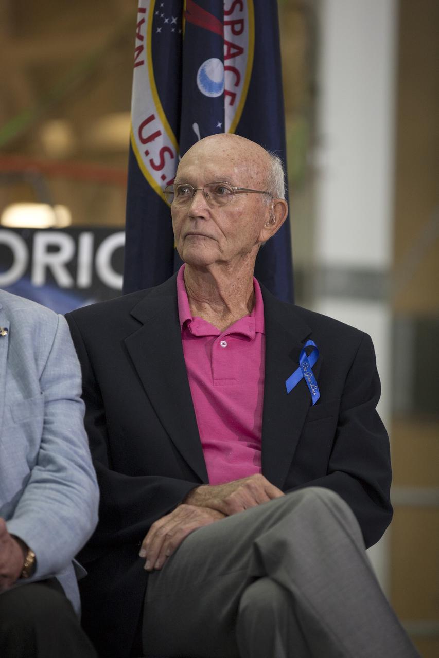 CAPE CANAVERAL, Fla. -- At the Kennedy Space Center in Florida, Apollo 11 astronaut Michael Collins participates in a ceremony renaming the refurbished Operations and Checkout Building for Apollo 11 astronaut Neil Armstrong, the first person to set foot on the moon. The building's high bay is being used to support the agency's new Orion spacecraft and is the same spaceport facility where the Apollo 11 command/service module and lunar module were prepped for the first lunar landing mission in 1969. Orion is designed to take humans farther than they’ve ever gone before, serving as the exploration vehicle that will carry astronauts to deep space and sustain the crew during travel to destinations such as an asteroid or Mars.    The ceremony was part of NASA's 45th anniversary celebration of the Apollo 11 moon landing. As the world watched, Neil Armstrong and Buzz Aldrin landed in the moon's Sea of Tranquility on July 20, 1969, aboard the lunar module Eagle. Meanwhile, crewmate Michael Collins orbited above in the command module Columbia. For more, visit http://www.nasa.gov/press/2014/july/nasa-honors-historic-first-moon-landing-eyes-first-mars-mission. Photo credit: NASA/Kim Shiflett