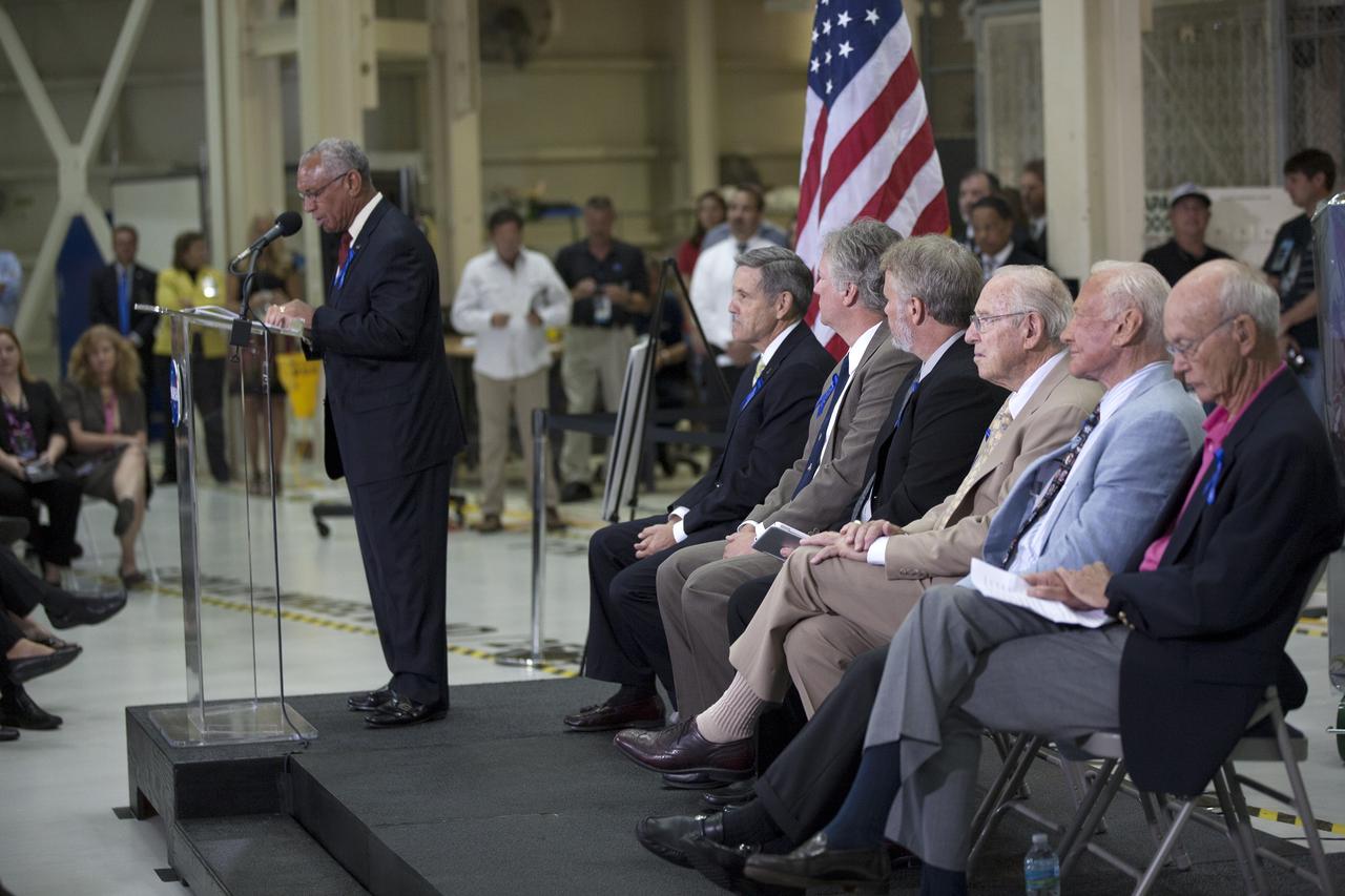 CAPE CANAVERAL, Fla. -- At the Kennedy Space Center in Florida, NASA Administrator Charles Bolden addresses the audience at a ceremony renaming the refurbished Operations and Checkout Building for Apollo 11 astronaut Neil Armstrong, the first person to set foot on the moon. Also participating in the ceremony are, from left, Center Director Robert Cabana, Armstrong's son Rick, Armstrong's son Mark, Apollo astronaut Jim Lovell, Apollo 11 astronaut Buzz Aldrin, and Apollo 11 astronaut Michael Collins. The building's high bay is being used to support the agency's new Orion spacecraft and is the same spaceport facility where the Apollo 11 command/service module and lunar module were prepped for the first lunar landing mission in 1969. Orion is designed to take humans farther than they’ve ever gone before, serving as the exploration vehicle that will carry astronauts to deep space and sustain the crew during travel to destinations such as an asteroid or Mars.    The ceremony was part of NASA's 45th anniversary celebration of the Apollo 11 moon landing. As the world watched, Neil Armstrong and Buzz Aldrin landed in the moon's Sea of Tranquility on July 20, 1969, aboard the lunar module Eagle. Meanwhile, crewmate Michael Collins orbited above in the command module Columbia. For more, visit http://www.nasa.gov/press/2014/july/nasa-honors-historic-first-moon-landing-eyes-first-mars-mission. Photo credit: NASA/Kim Shiflett