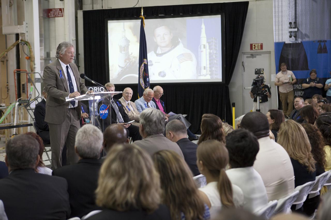 CAPE CANAVERAL, Fla. -- At the Kennedy Space Center in Florida, Rick Armstrong addresses the audience at a ceremony renaming the refurbished Operations and Checkout Building for Apollo 11 astronaut Neil Armstrong, the first person to set foot on the moon. Rick is Neil Armstrong's son. The building's high bay is being used to support the agency's new Orion spacecraft and is the same spaceport facility where the Apollo 11 command/service module and lunar module were prepped for the first lunar landing mission in 1969. Orion is designed to take humans farther than they’ve ever gone before, serving as the exploration vehicle that will carry astronauts to deep space and sustain the crew during travel to destinations such as an asteroid or Mars.    The ceremony was part of NASA's 45th anniversary celebration of the Apollo 11 moon landing. As the world watched, Neil Armstrong and Buzz Aldrin landed in the moon's Sea of Tranquility on July 20, 1969, aboard the lunar module Eagle. Meanwhile, crewmate Michael Collins orbited above in the command module Columbia. For more, visit http://www.nasa.gov/press/2014/july/nasa-honors-historic-first-moon-landing-eyes-first-mars-mission. Photo credit: NASA/Kim Shiflett