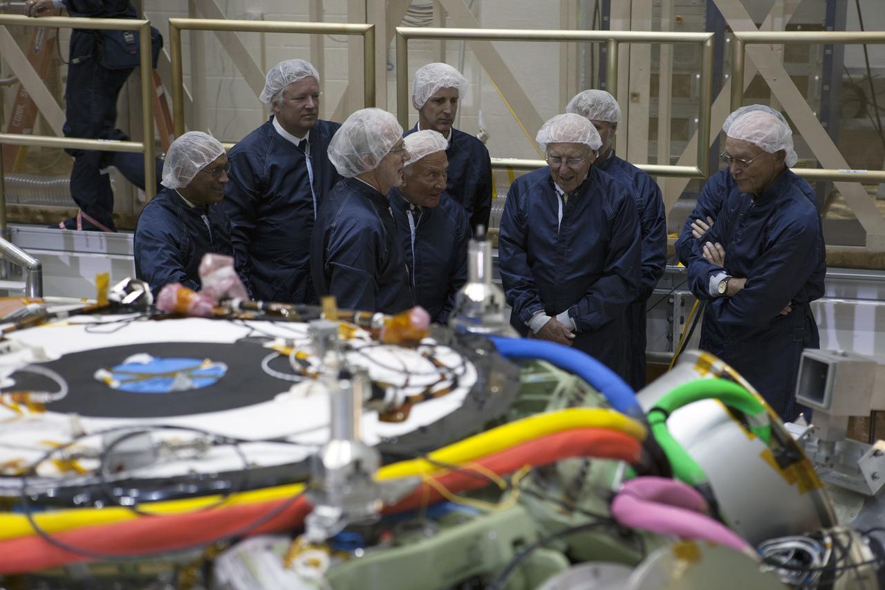 CAPE CANAVERAL, Fla. -- At the Kennedy Space Center in Florida, NASA officials and Apollo astronauts tour the refurbished Operations and Checkout Building, newly named for Apollo 11 astronaut Neil Armstrong, the first person to set foot on the moon. From left, are NASA Administrator Charlie Bolden, Rick Armstrong, Mark Geyer, Orion Program manager, Apollo 11 astronaut Buzz Aldrin, Scott Wilson, manager, production operations for the Orion Program, and Apollo astronaut Jim Lovell. Behind Lovell is Mark Armstrong, Apollo 11 astronaut Michael Collins, and partially hidden is Kennedy Center Director Bob Cabana. The building's high bay is being used to support the agency's new Orion spacecraft, which will lift off atop the Space Launch System. Orion is designed to take humans farther than they've ever gone before, serving as the exploration vehicle that will carry astronauts to deep space and sustain the crew during travel to destinations such as an asteroid or Mars.     The visit of the former astronauts was part of NASA's 45th anniversary celebration of the moon landing. As the world watched, Neil Armstrong and Aldrin landed in the moon's Sea of Tranquility aboard the lunar module Eagle on July 20, 1969. Meanwhile, crewmate Collins orbited above in the command module Columbia. For more, visit http://www.nasa.gov/press/2014/july/nasa-honors-historic-first-moon-landing-eyes-first-mars-mission. Photo credit: NASA/Kim Shiflett
