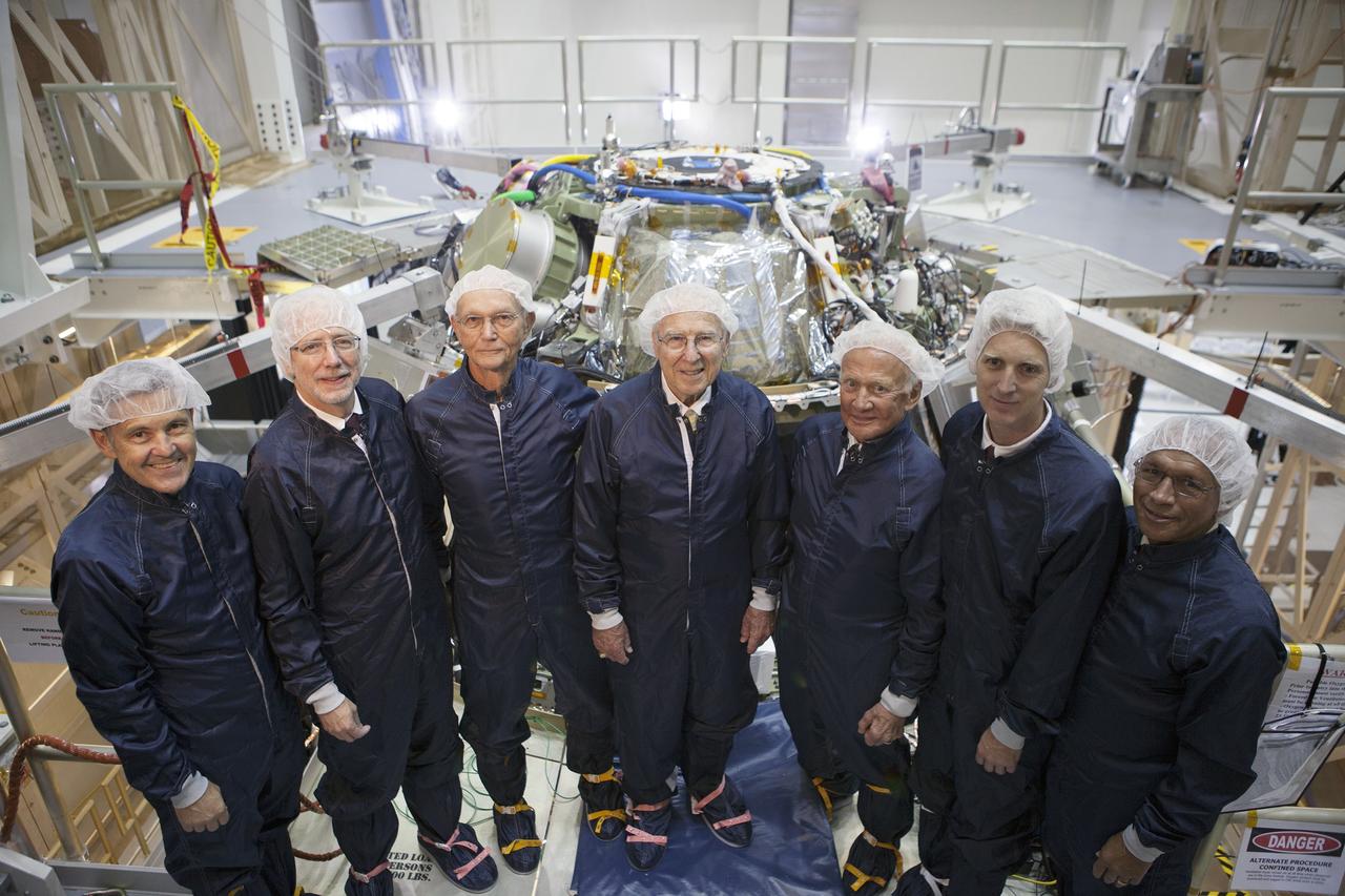 CAPE CANAVERAL, Fla. -- At the Kennedy Space Center in Florida, NASA officials and Apollo astronauts tour the refurbished Operations and Checkout Building, newly named for Apollo 11 astronaut Neil Armstrong, the first person to set foot on the moon. Viewing the Orion crew module stacked on top of the service module from left, are Kennedy Center Director Bob Cabana, Mark Geyer, Orion Program manager, Apollo 11 astronaut Michael Collins, Apollo astronaut Jim Lovell, Apollo 11 astronaut Buzz Aldrin, Scott Wilson, manager, production operations for the Orion Program, and NASA Administrator Charlie Bolden. The building's high bay is being used to support the agency's new Orion spacecraft, which will lift off atop the Space Launch System. Orion is designed to take humans farther than they've ever gone before, serving as the exploration vehicle that will carry astronauts to deep space and sustain the crew during travel to destinations such as an asteroid or Mars. The visit of the former astronauts was part of NASA's 45th anniversary celebration of the moon landing. As the world watched, Neil Armstrong and Aldrin landed in the moon's Sea of Tranquility aboard the lunar module Eagle on July 20, 1969. Meanwhile, crewmate Collins orbited above in the command module Columbia. For more, visit http://www.nasa.gov/press/2014/july/nasa-honors-historic-first-moon-landing-eyes-first-mars-mission. Photo credit: NASA/Kim Shiflett