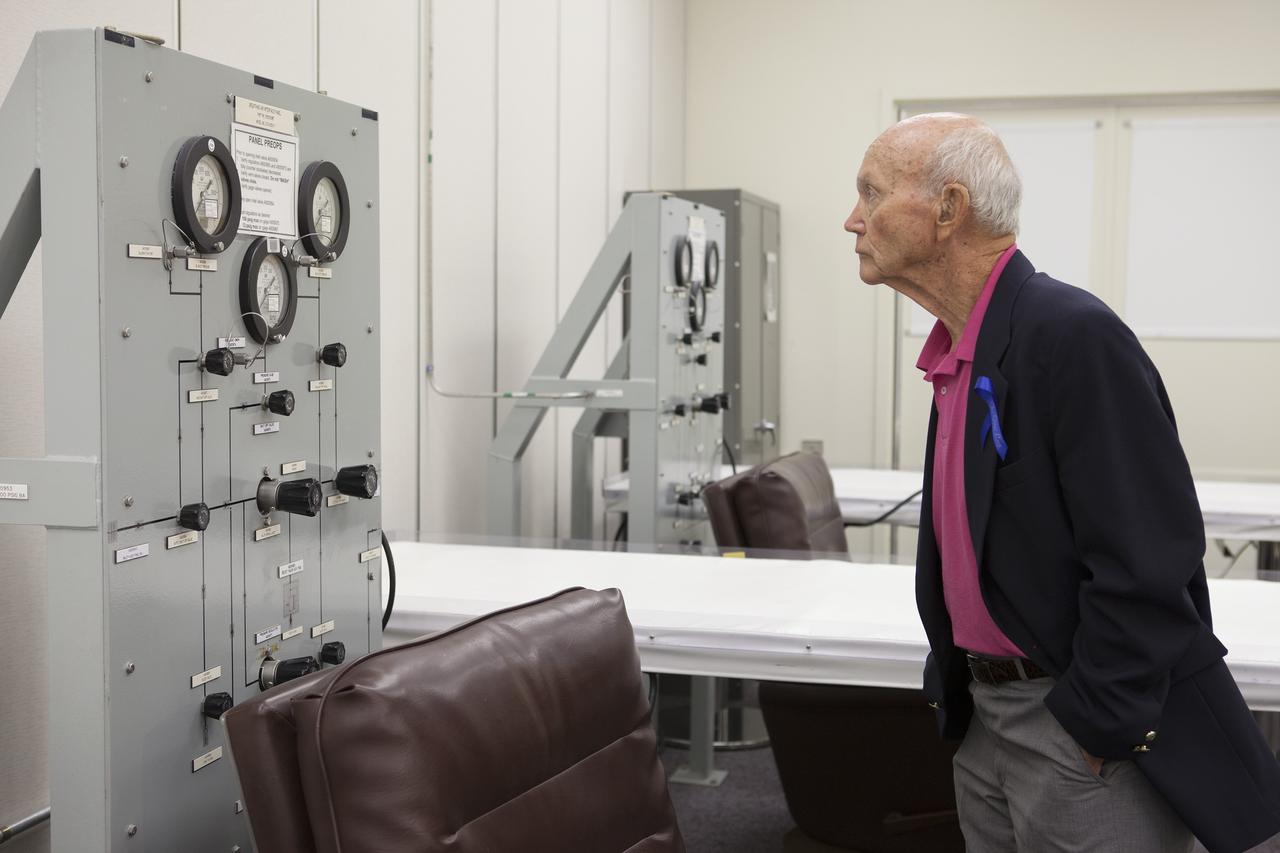 CAPE CANAVERAL, Fla. -- Apollo 11 astronaut Michael Collins checks out some equipment during a tour of the astronaut crew quarters in the Operations and Checkout Building at NASA's Kennedy Space Center in Florida. The tour followed a ceremony renaming the refurbished Operations and Checkout Building for Apollo 11 astronaut Neil Armstrong, the first person to set foot on the moon. Besides housing the crew quarters, the building's high bay is being used to support the agency's new Orion spacecraft and is the same spaceport facility where the Apollo 11 command/service module and lunar module were prepped for the first lunar landing mission in 1969. Orion is designed to take humans farther than they’ve ever gone before, serving as the exploration vehicle that will carry astronauts to deep space and sustain the crew during travel to destinations such as an asteroid or Mars.    The visit of the former astronauts was part of NASA's 45th anniversary celebration of the moon landing. As the world watched, Neil Armstrong and Aldrin landed in the moon's Sea of Tranquility aboard the lunar module Eagle on July 20, 1969. Meanwhile, crewmate Collins orbited above in the command module Columbia. For more, visit http://www.nasa.gov/press/2014/july/nasa-honors-historic-first-moon-landing-eyes-first-mars-mission. Photo credit: NASA/Kim Shiflett