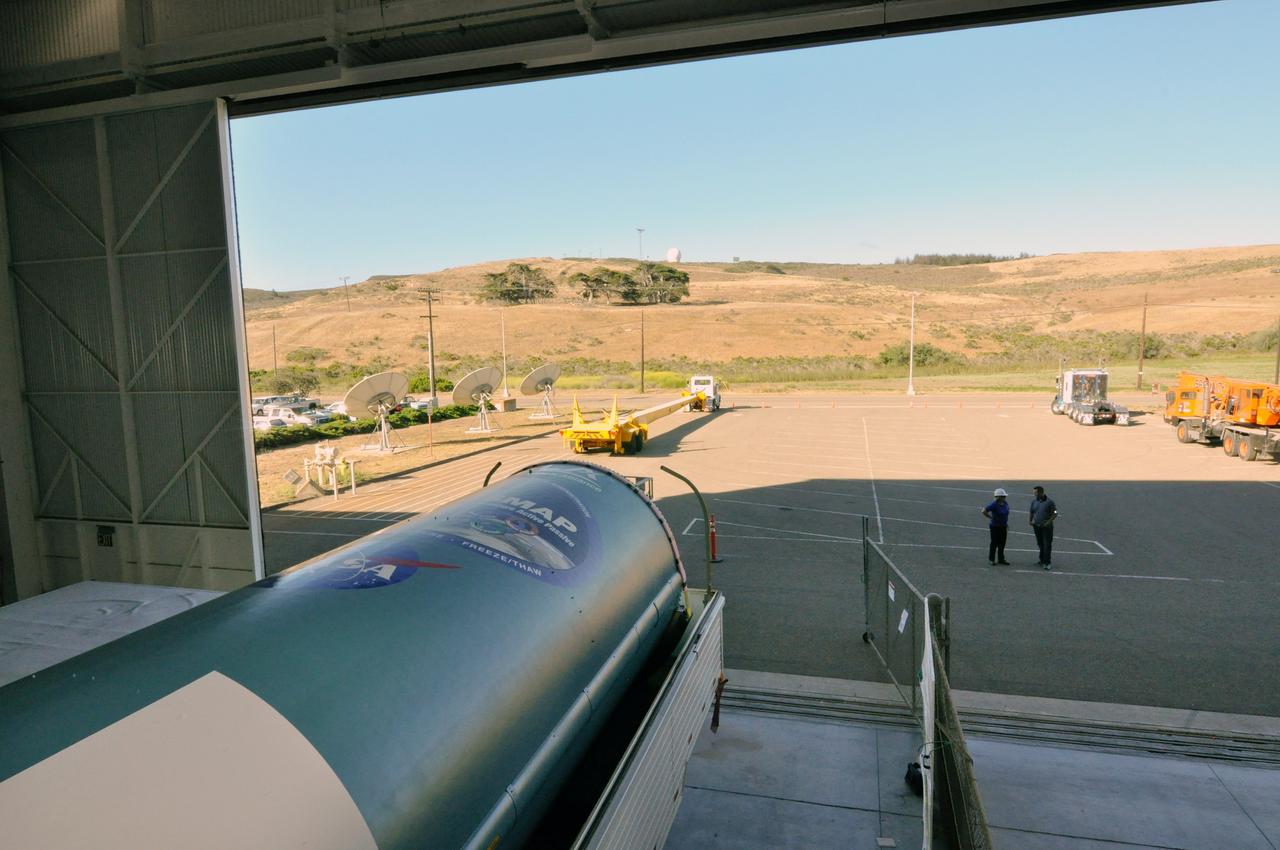 VANDENBERG AIR FORCE BASE, Calif. – The first stage of a United Launch Alliance Delta II rocket arrives at NASA hangar 836 on Vandenberg Air Force Base in California. The Delta II rocket will be used to deliver NASA's Soil Moisture Active Passive mission, or SMAP, into orbit.      SMAP will provide global measurements of soil moisture and its freeze/thaw state. These measurements will be used to enhance understanding of processes that link the water, energy and carbon cycles, and to extend the capabilities of weather and climate prediction models. SMAP data also will be used to quantify net carbon flux in boreal landscapes and to develop improved flood prediction and drought monitoring capabilities. Launch is scheduled for November 2014. To learn more about SMAP, visit http://smap.jpl.nasa.gov Photo credit: NASA/Randy Beaudoin