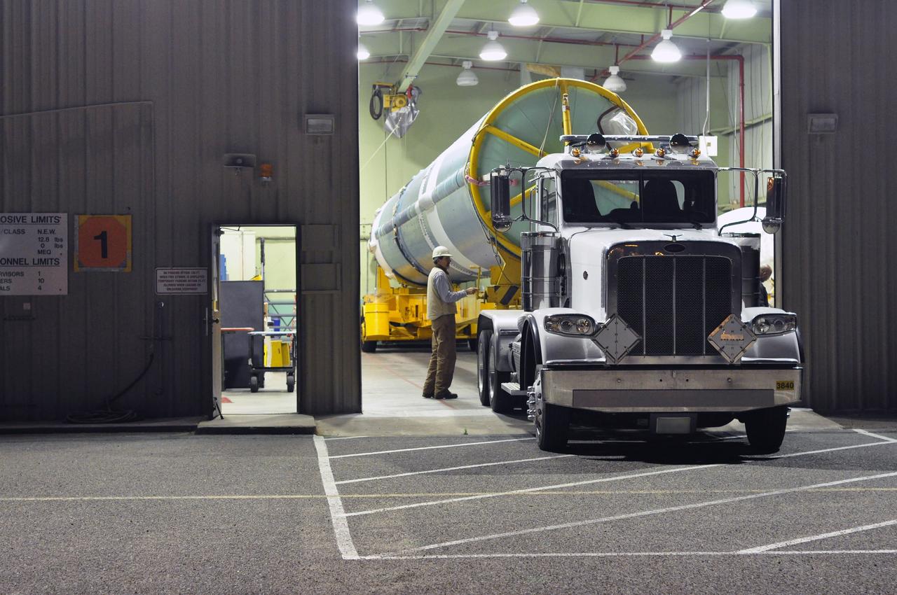 VANDENBERG AIR FORCE BASE, Calif. – The first stage of the United Launch Alliance Delta II rocket for NASA's Soil Moisture Active Passive mission, or SMAP, is readied for the short trip from the Horizontal Processing Facility to the mobile service tower at Space Launch Complex 2 on Vandenberg Air Force Base in California.    SMAP will provide global measurements of soil moisture and its freeze/thaw state. These measurements will be used to enhance understanding of processes that link the water, energy and carbon cycles, and to extend the capabilities of weather and climate prediction models. SMAP data also will be used to quantify net carbon flux in boreal landscapes and to develop improved flood prediction and drought monitoring capabilities. Launch is scheduled for November 2014. To learn more about SMAP, visit http://smap.jpl.nasa.gov.  Photo credit: NASA/Randy Beaudoin