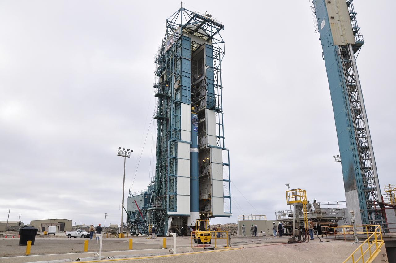 VANDENBERG AIR FORCE BASE, Calif. – The first stage of the United Launch Alliance Delta II rocket for NASA's Soil Moisture Active Passive mission, or SMAP, is positioned in the mobile service tower at Space Launch Complex 2 on Vandenberg Air Force Base in California in preparation for mating with the rocket's second stage.    SMAP will provide global measurements of soil moisture and its freeze/thaw state. These measurements will be used to enhance understanding of processes that link the water, energy and carbon cycles, and to extend the capabilities of weather and climate prediction models. SMAP data also will be used to quantify net carbon flux in boreal landscapes and to develop improved flood prediction and drought monitoring capabilities. Launch is scheduled for November 2014. To learn more about SMAP, visit http://smap.jpl.nasa.gov.  Photo credit: NASA/Randy Beaudoin