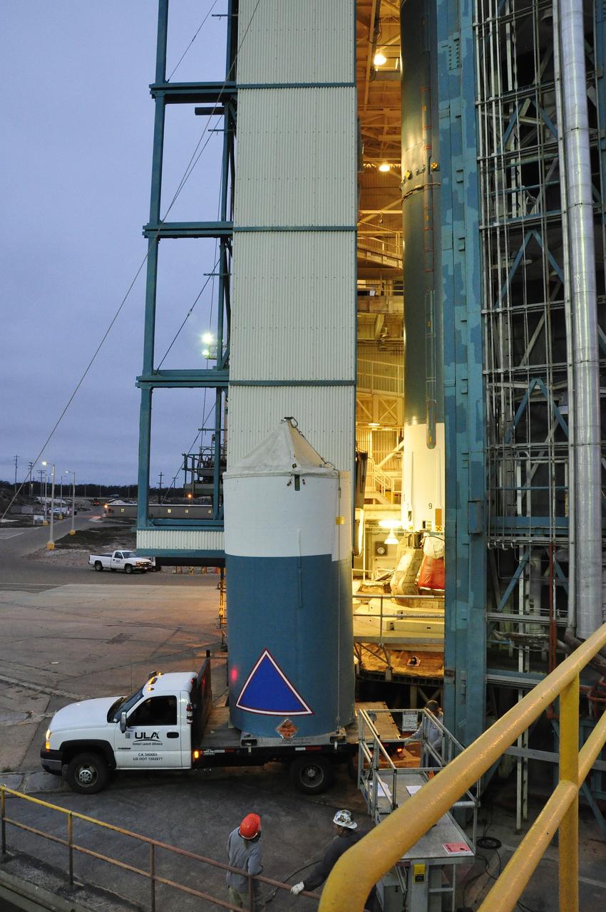 VANDENBERG AIR FORCE BASE, Calif. – Preparations are underway to hoist the Delta II interstage adapter, or ISA, for NASA's Soil Moisture Active Passive mission, or SMAP, into the mobile service tower at Space Launch Complex 2 on Vandenberg Air Force Base in California.    Processing of the United Launch Alliance Delta II rocket that will loft SMAP into orbit is underway at the pad. The ISA connects the Delta II first and second stages and encloses the second stage engine and thrust section. The spacecraft will provide global measurements of soil moisture and its freeze/thaw state. These measurements will be used to enhance understanding of processes that link the water, energy and carbon cycles, and to extend the capabilities of weather and climate prediction models. The data returned also will be used to quantify net carbon flux in boreal landscapes and to develop improved flood prediction and drought monitoring capabilities. Launch is scheduled for November 2014. To learn more about SMAP, visit http://smap.jpl.nasa.gov.  Photo credit: NASA/Randy Beaudoin
