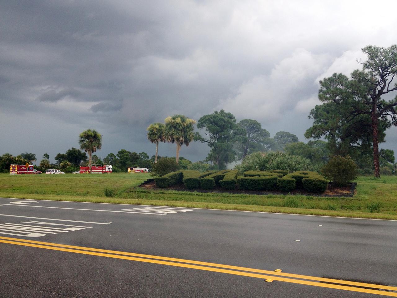 CAPE CANAVERAL, Fla. – Emergency responders are called to the scene of a brush fire near Headquarters Building in the Industrial Area of NASA’s Kennedy Space Center in Florida. The fire was ignited by a lightning strike.    The space center is nestled on the Merritt Island National Wildlife Refuge, which is managed by the U.S. Fish and Wildlife Service. Chenega Security & Support Solutions is responsible for Kennedy's Fire Rescue Department. For information on the refuge, visit http://www.fws.gov/merrittisland/Index.html. For more on Kennedy Space Center, visit http://www.nasa.gov/kennedy. Photo credit: NASA/Ben Smegelsky