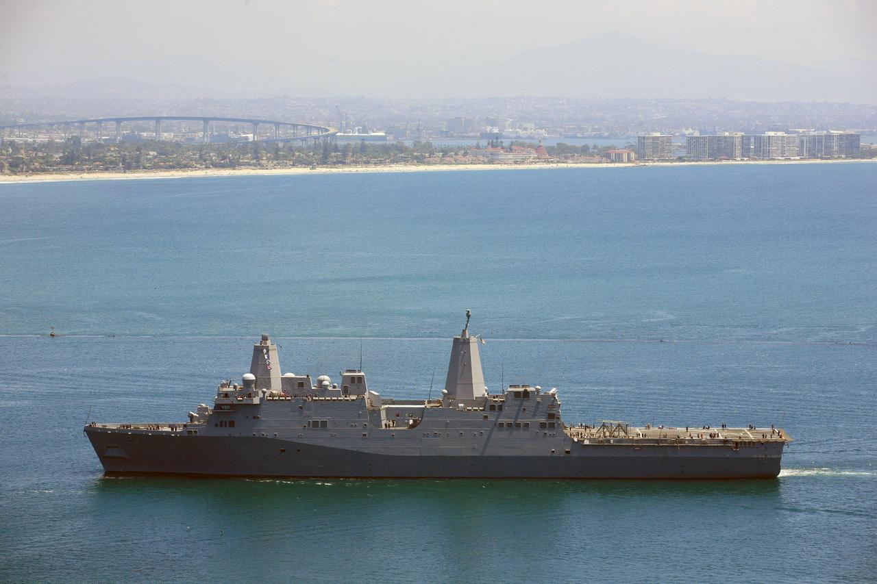 SAN DIEGO, Calif. – The USS Anchorage returns to the Naval Base San Diego after completion of the Orion Underway Recovery Test 2 in the Pacific Ocean. NASA, Lockheed Martin and the U.S. Navy conducted the test on the Orion boilerplate test vehicle to prepare for recovery of the Orion crew module on its return from a deep space mission. The underway recovery test allowed the team to demonstrate and evaluate the recovery processes, procedures, new hardware and personnel in open waters.    The Ground Systems Development and Operations Program conducted the underway recovery test. Orion is the exploration spacecraft designed to carry astronauts to destinations not yet explored by humans, including an asteroid and Mars. It will have emergency abort capability, sustain the crew during space travel and provide safe re-entry from deep space return velocities. The first unpiloted test flight of the Orion is scheduled to launch in 2014 atop a Delta IV rocket and in 2017 on NASA’s Space Launch System rocket. For more information, visit http://www.nasa.gov/orion. Photo credit: NASA/Kim Shiflett