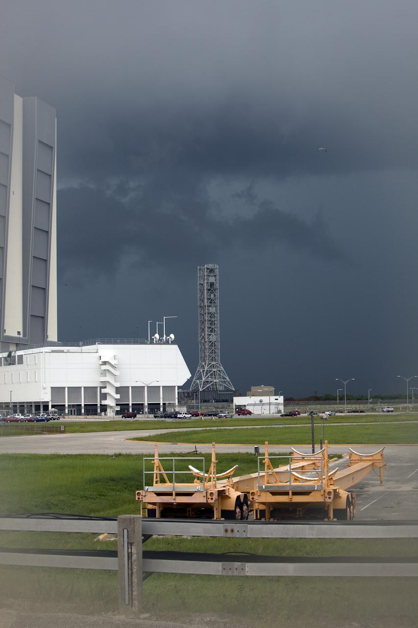 CAPE CANAVERAL, Fla. – A storm moves in over Launch Complex 39 at NASA’s Kennedy Space Center in Florida. At center is the mobile launcher that will support NASA's Space Launch System heavy-lift rocket, under development. At left is the Launch Control Center and the Vehicle Assembly Building. Kennedy's Ground Support Development and Operations Program is hard at work transforming the center's facilities into a multi-user spaceport, when the weather permits. For more on Kennedy Space Center, visit http://www.nasa.gov/kennedy. Photo credit: NASA/Ben Smegelsky