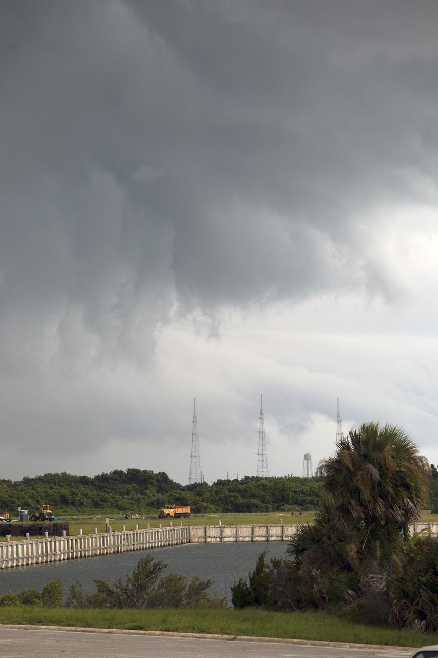 CAPE CANAVERAL, Fla. – The lightning suppression system on Launch Pad 39B soon may be put to the test by a thunderstorm moving through the launch complex at NASA’s Kennedy Space Center in Florida.    Kennedy's Ground Support Development and Operations Program is hard at work transforming the center's facilities into a multi-user spaceport, when the weather permits. For more on Kennedy Space Center, visit http://www.nasa.gov/kennedy. Photo credit: NASA/Ben Smegelsky