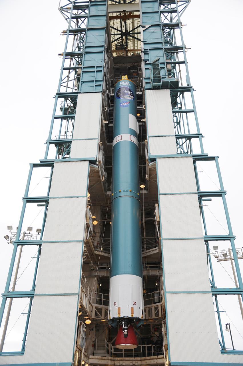 VANDENBERG AIR FORCE BASE, Calif. – A crane transfers the first stage of the United Launch Alliance Delta II rocket for NASA's Soil Moisture Active Passive mission, or SMAP, into the mobile service tower at Space Launch Complex 2 on Vandenberg Air Force Base in California. SMAP will provide global measurements of soil moisture and its freeze/thaw state. These measurements will be used to enhance understanding of processes that link the water, energy and carbon cycles, and to extend the capabilities of weather and climate prediction models. SMAP data also will be used to quantify net carbon flux in boreal landscapes and to develop improved flood prediction and drought monitoring capabilities. Launch is scheduled for November 2014. To learn more about SMAP, visit http://smap.jpl.nasa.gov. Photo credit: NASA/Tony Vauccin, USAF