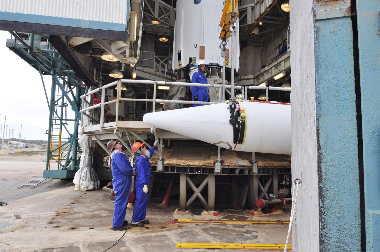 VANDENBERG AIR FORCE BASE, Calif. – A second solid rocket motor for the Delta II rocket for NASA's Soil Moisture Active Passive mission, or SMAP, arrives at the mobile service tower at Space Launch Complex 2 on Vandenberg Air Force Base in California.    SMAP will be launched on a Delta II 7320 configuration vehicle featuring a United Launch Alliance first stage booster powered by an Aerojet Rocketdyne RS-27A main engine and three Alliant Techsystems, or ATK, strap-on solid rocket motors. Once on station in Earth orbit, SMAP will provide global measurements of soil moisture and its freeze/thaw state. These measurements will be used to enhance understanding of processes that link the water, energy and carbon cycles, and to extend the capabilities of weather and climate prediction models. SMAP data also will be used to quantify net carbon flux in boreal landscapes and to develop improved flood prediction and drought monitoring capabilities. Launch is scheduled for no earlier than November 2014. To learn more about SMAP, visit http://smap.jpl.nasa.gov.  Photo credit: NASA/Randy Beaudoin
