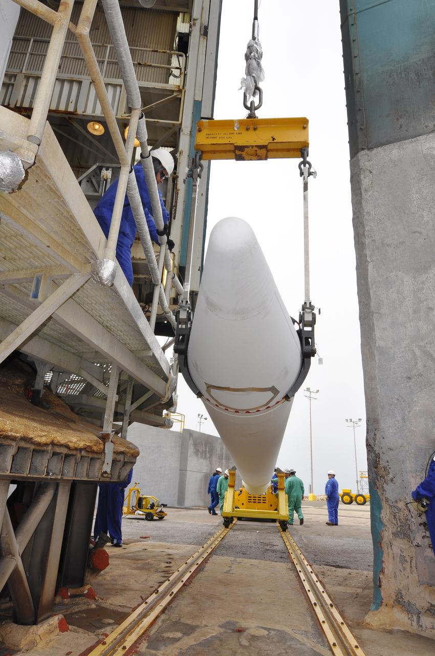 VANDENBERG AIR FORCE BASE, Calif. – A second solid rocket motor for the Delta II rocket for NASA's Soil Moisture Active Passive mission, or SMAP, is raised into a vertical position at the mobile service tower at Space Launch Complex 2 on Vandenberg Air Force Base in California.    SMAP will be launched on a Delta II 7320 configuration vehicle featuring a United Launch Alliance first stage booster powered by an Aerojet Rocketdyne RS-27A main engine and three Alliant Techsystems, or ATK, strap-on solid rocket motors. Once on station in Earth orbit, SMAP will provide global measurements of soil moisture and its freeze/thaw state. These measurements will be used to enhance understanding of processes that link the water, energy and carbon cycles, and to extend the capabilities of weather and climate prediction models. SMAP data also will be used to quantify net carbon flux in boreal landscapes and to develop improved flood prediction and drought monitoring capabilities. Launch is scheduled for no earlier than November 2014. To learn more about SMAP, visit http://smap.jpl.nasa.gov.  Photo credit: NASA/Randy Beaudoin