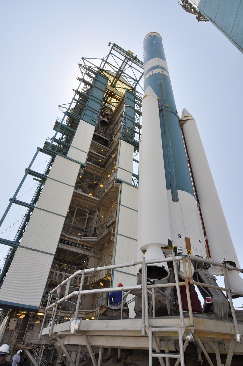 VANDENBERG AIR FORCE BASE, Calif. – The second stage of the Delta II rocket for NASA's Soil Moisture Active Passive mission, or SMAP, is transferred into the top of the mobile service tower at Space Launch Complex 2 on Vandenberg Air Force Base in California.    Operations are underway to install the second stage atop the rocket's first stage. SMAP will launch on a Delta II 7320 configuration vehicle featuring a United Launch Alliance first stage booster powered by an Aerojet Rocketdyne RS-27A main engine and three Alliant Techsystems, or ATK, strap-on solid rocket motors. Once on station in Earth orbit, SMAP will provide global measurements of soil moisture and its freeze/thaw state. These measurements will be used to enhance understanding of processes that link the water, energy and carbon cycles, and to extend the capabilities of weather and climate prediction models. SMAP data also will be used to quantify net carbon flux in boreal landscapes and to develop improved flood prediction and drought monitoring capabilities. Launch is scheduled for no earlier than November 2014. To learn more about SMAP, visit http://smap.jpl.nasa.gov.  Photo credit: NASA/Randy Beaudoin