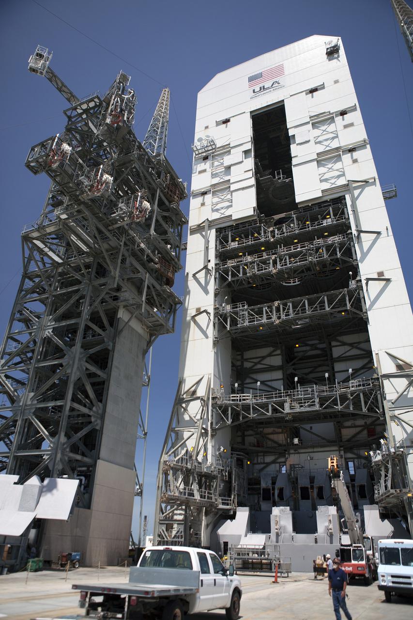CAPE CANAVERAL, Fla. – The umbilical swing arm for Orion's Exploration Flight Test 1, or EFT-1, has been attached to the uppermost location on the fixed umbilical tower at Space Launch Complex 37 at Cape Canaveral Air Force Station in Florida. All three swing arms on the tower will undergo tests to confirm that they are operating correctly.    The uppermost swing arm will carry umbilicals that will be mated to Orion's launch abort system and environmental control system. During launch, all three umbilicals will pull away from Orion and the United Launch Alliance Delta IV Heavy rocket at T-0. During the EFT-1 mission, Orion will travel farther into space than any human spacecraft has gone in more than 40 years.  The data gathered during the flight will influence design decisions, validate existing computer models and innovative new approaches to space systems development, as well as reduce overall mission risks and costs for later Orion flights. Liftoff of Orion on its first flight test is planned for fall 2014. Photo credit: NASA/Daniel Casper