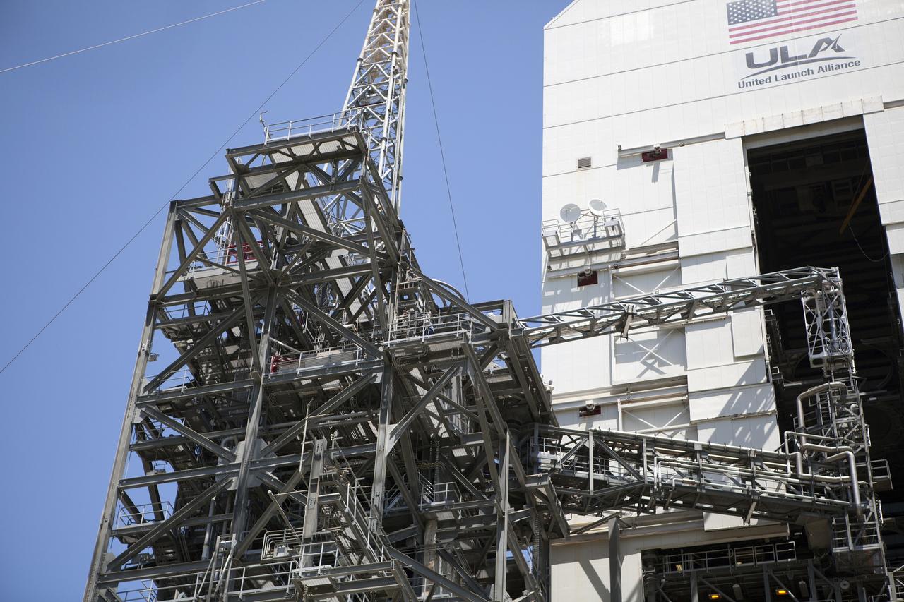 CAPE CANAVERAL, Fla. – The umbilical swing arm for Orion's Exploration Flight Test 1, or EFT-1, has been attached to the uppermost location on the fixed umbilical tower at Space Launch Complex 37 at Cape Canaveral Air Force Station in Florida. The swing arm is undergoing a test to confirm that it is operating correcting. During the test, the arm was swung out and closer to the Vertical Integration Facility at the pad.    The uppermost swing arm will carry umbilicals that will be mated to Orion's launch abort system and environmental control system. During launch, all three umbilicals will pull away from Orion and the United Launch Alliance Delta IV Heavy rocket at T-0. During the EFT-1 mission, Orion will travel farther into space than any human spacecraft has gone in more than 40 years.  The data gathered during the flight will influence design decisions, validate existing computer models and innovative new approaches to space systems development, as well as reduce overall mission risks and costs for later Orion flights. Liftoff of Orion on its first flight test is planned for fall 2014. Photo credit: NASA/Daniel Casper
