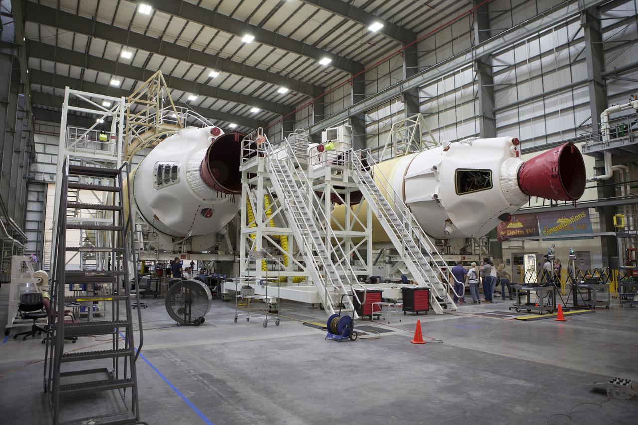 CAPE CANAVERAL, Fla. – Preparations are underway to begin mating the United Launch Alliance Delta IV port booster to the core booster inside the Horizontal Integration Facility at Space Launch Complex 37 on Cape Canaveral Air Force Station in Florida. The Delta IV Heavy rocket will launch an uncrewed Orion spacecraft on Exploration Flight Test-1. During the mission, Orion will travel farther into space than any human spacecraft has gone in more than 40 years. The data gathered during the flight will influence design decisions, validate existing computer models and innovative new approaches to space systems development, as well as reduce overall mission risks and costs for later Orion flights. Liftoff of Orion on the first flight test is planned for December 2014. Photo credit: NASA/Ben Smegelsky